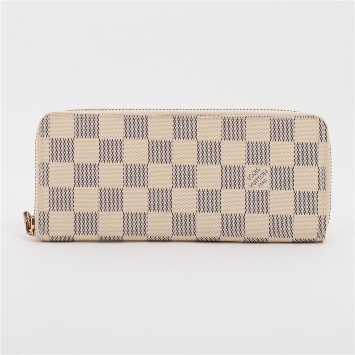 The Louis Vuitton Damier Azur Clemence Wallet in Rose Ballerine is a stylish and functional long wallet that combines timeless elegance with everyday practicality. Crafted from Louis Vuitton’s iconic Damier Azur canvas, it features a soft pink Rose