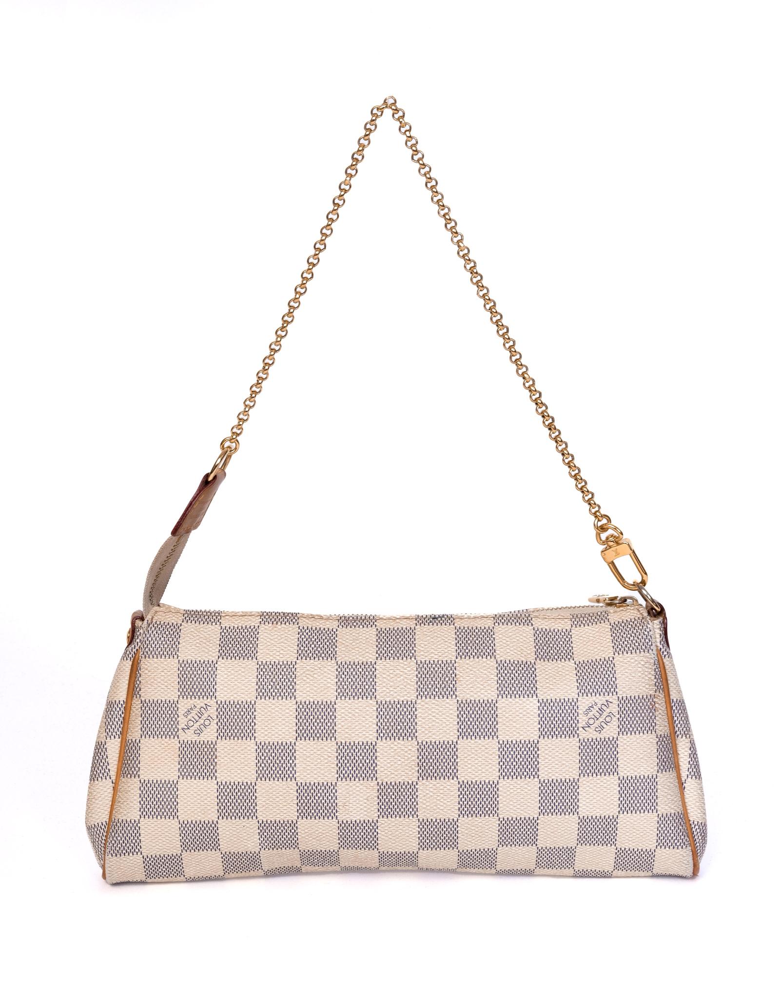This bag is made with Damier Azur coated canvas and features tan natural leather trim, a chain strap, metal plate with logo, brass hardware, top zip closure, and a tan woven fabric interior. (Damier is French for checkerboard)

COLOR: White/Damier