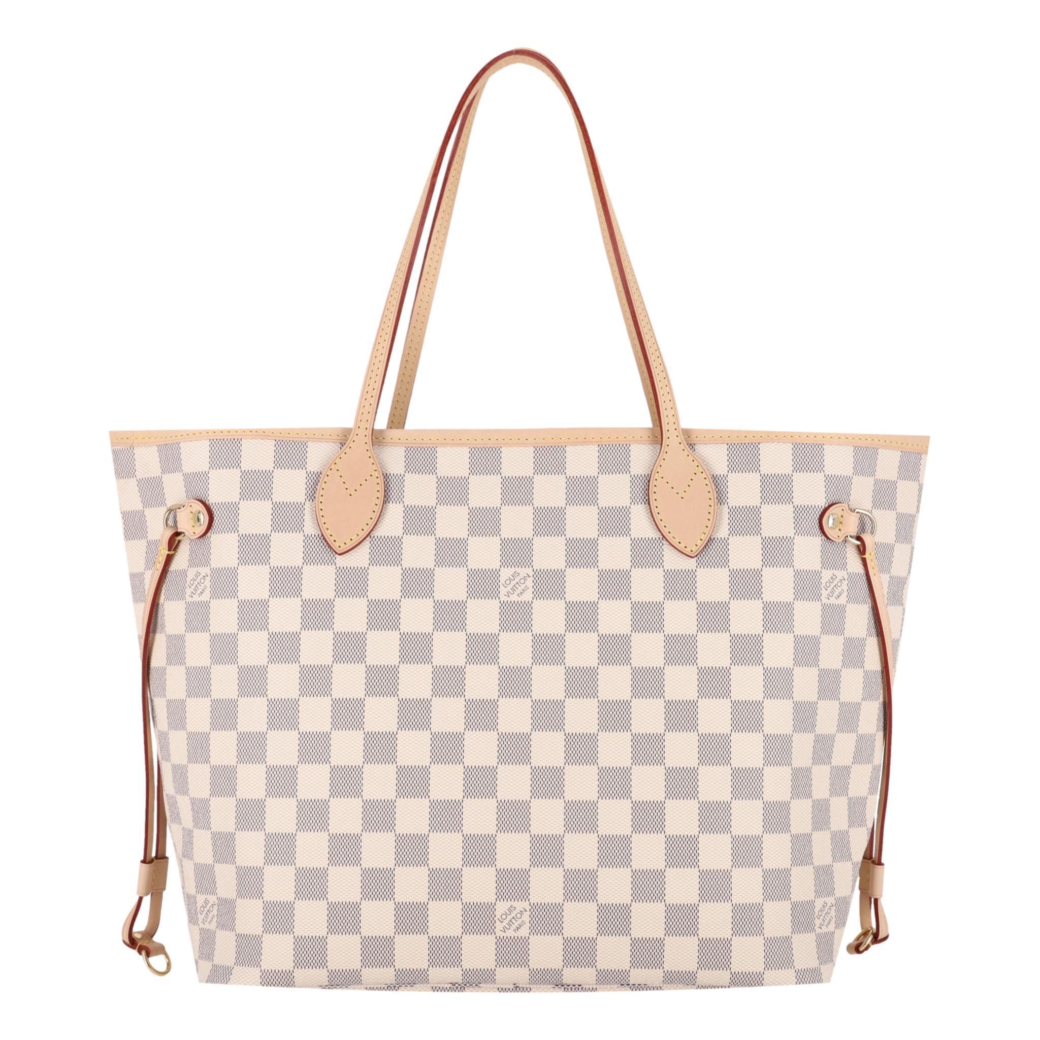 Louis Vuitton Damier Azur GM Neverfull Coated Canvas Tote Bag

Iconic Neverfull shoulder bag crafted in signature Damier Azur coated canvas with light brown leather trims, side laces and dual shoulder strap.

Designed with gold,  branded hardware