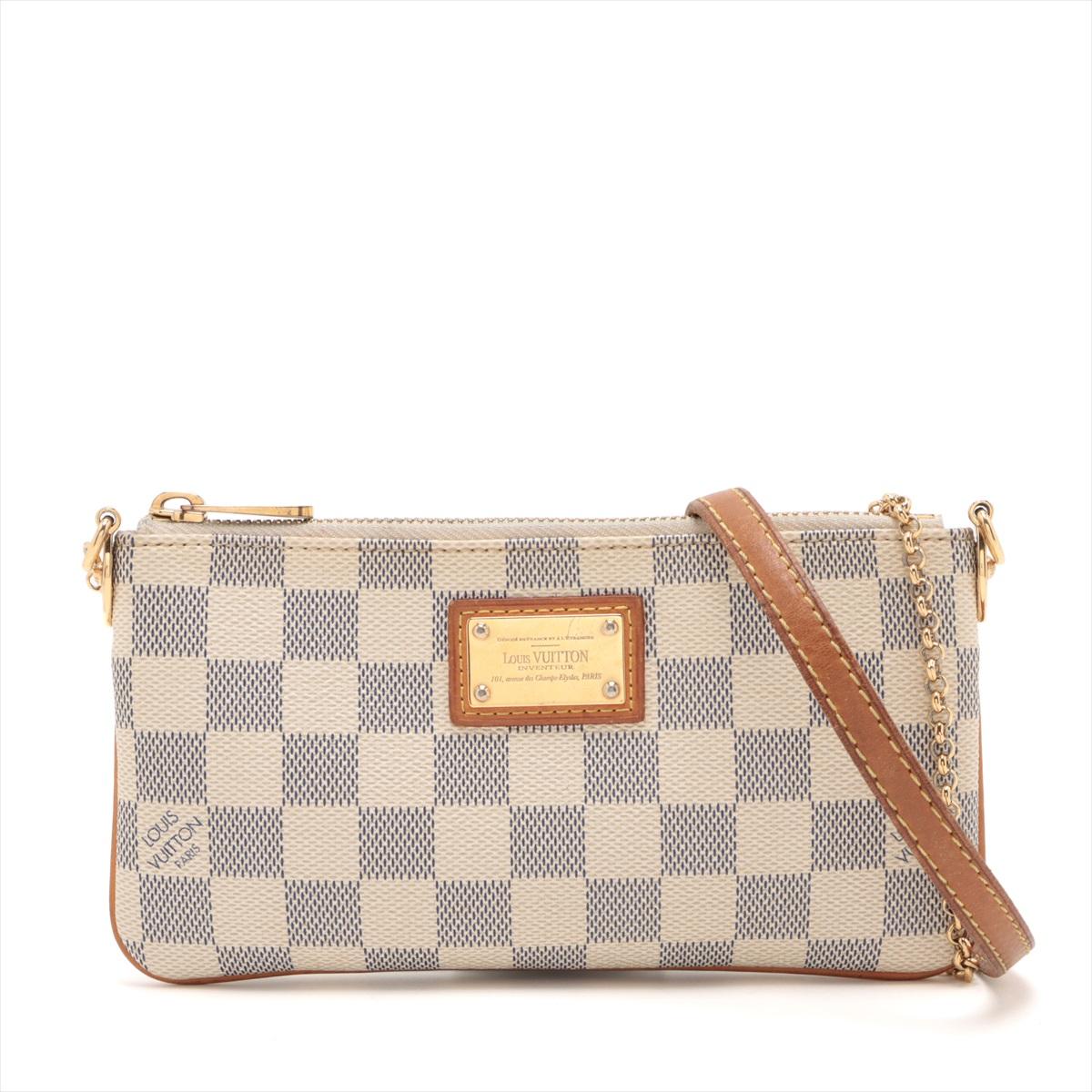 The Louis Vuitton Damier Azur Pochette Milla MM is a stylish and versatile accessory crafted from the brand's iconic Damier Azur canvas. With its compact yet practical design, the pochette is perfect for carrying essentials on the go. The light and