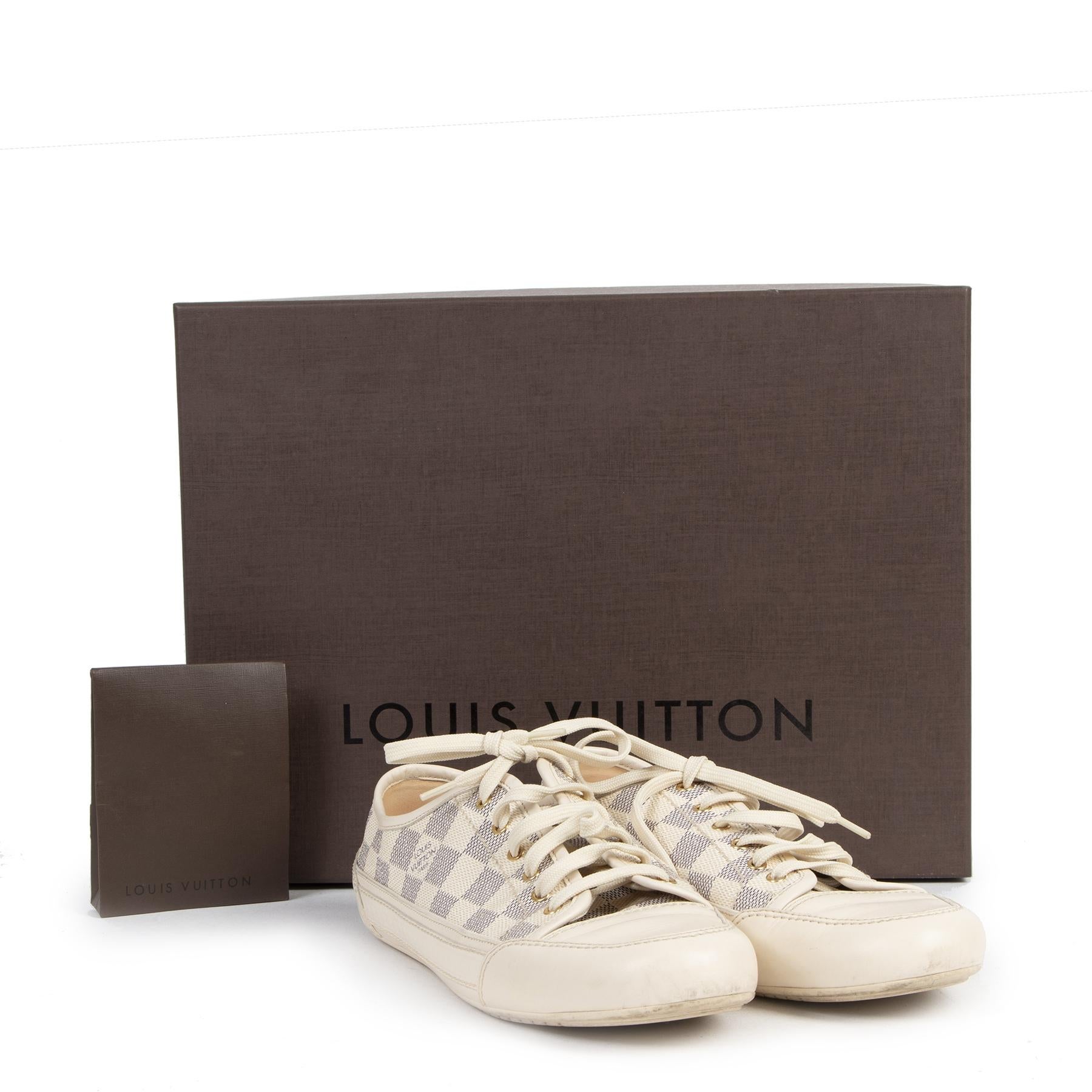 Very good condition

Louis Vuitton Damier Azur Sneakers - Size 40

These Louis Vuitton sneakers are the perfect mix between comfort and luxury. The shoes are crafted in the iconic damier azur canvas and feature gold toned details and the LV logo