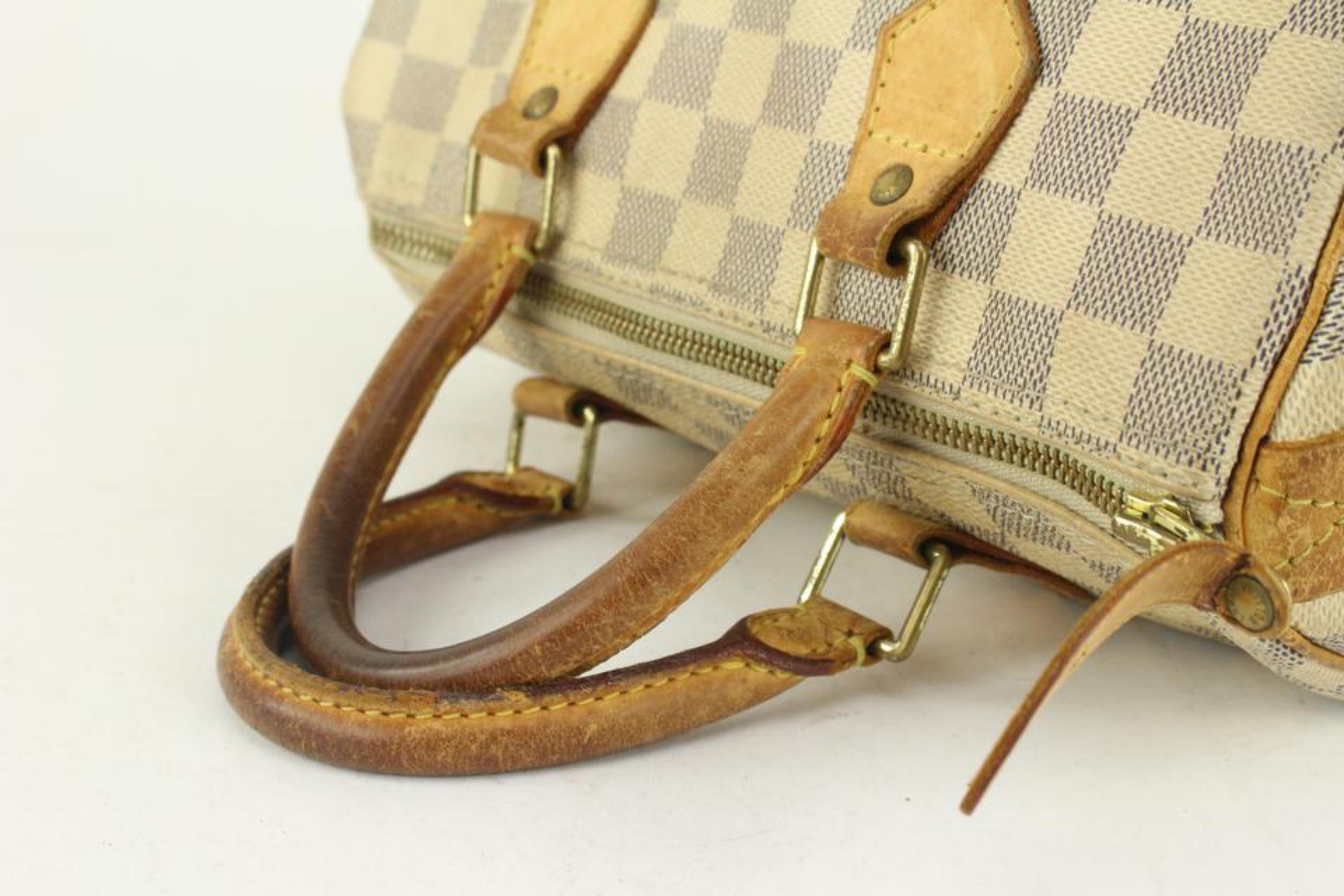Louis Vuitton Damier Azur Speedy 25 Boston Bag 1122lv10
Date Code/Serial Number: SP2047
Made In: France
Measurements: Length:  10