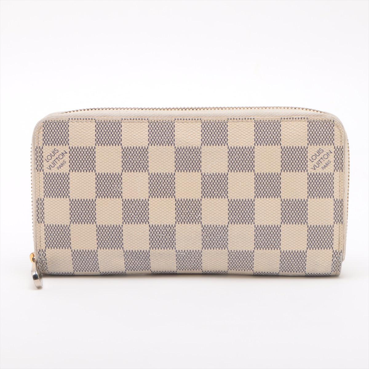 The Louis Vuitton Damier Azur Zippy Wallet is a chic and timeless accessory that combines elegance with practicality. Crafted from the iconic Damier Azur canvas, it features a fresh and feminine checkered design in soft tones, perfect for a light