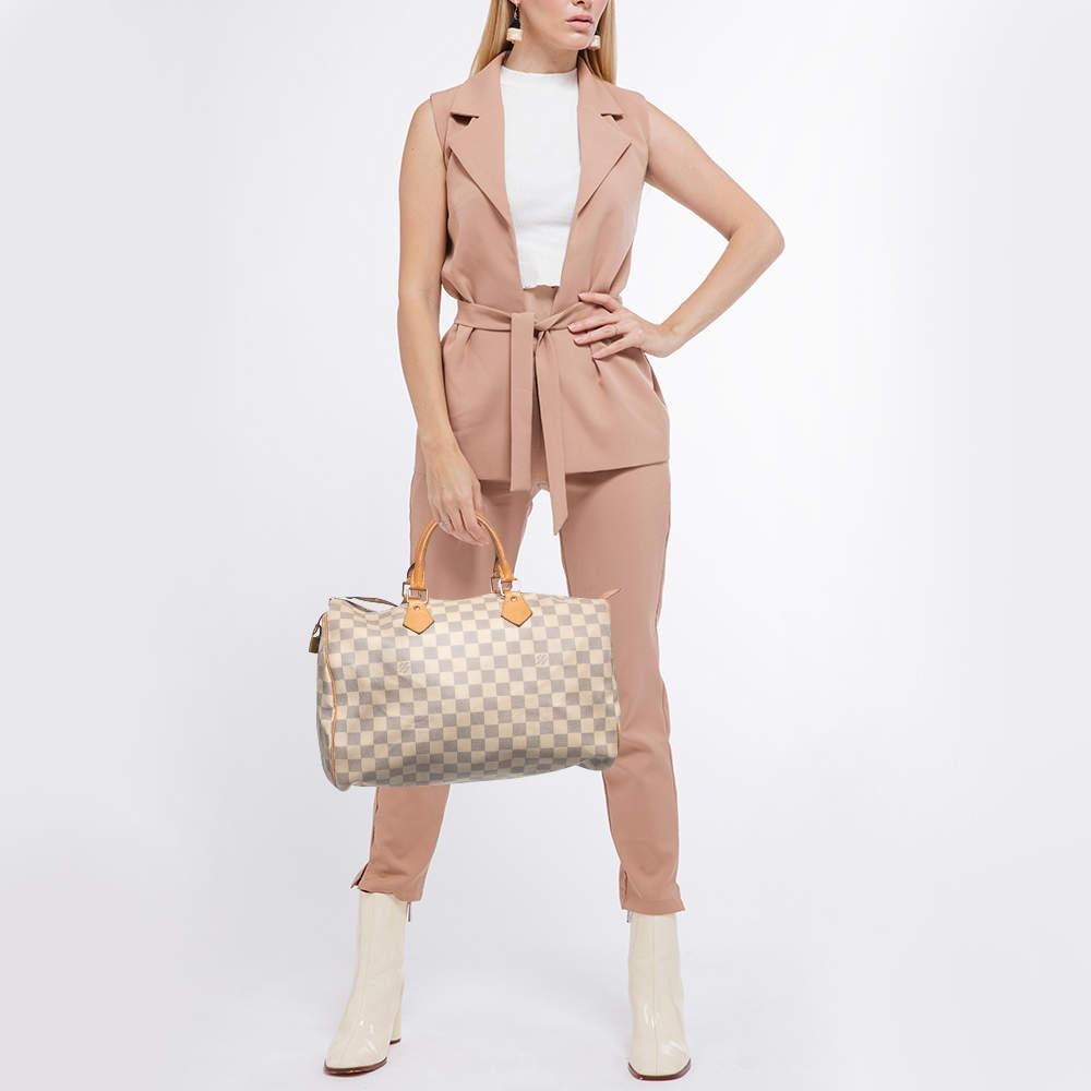 Titled as one of the greatest handbags in the history of luxury fashion, the Speedy from Louis Vuitton was first created for everyday use as a smaller version of their famous Keepall bag. This Speedy comes crafted from Damier Azure canvas and