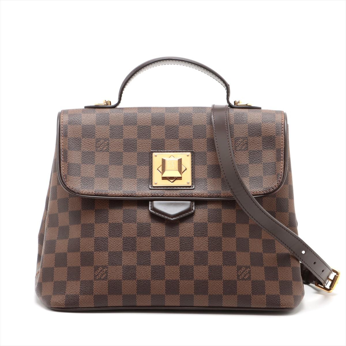 The Louis Vuitton Damier Ebene Bergamo MM is an exquisite handbag that seamlessly combines sophistication with practicality. Crafted from the iconic Damier Ebene canvas, the bag showcases Louis Vuitton's signature checkered pattern in rich brown