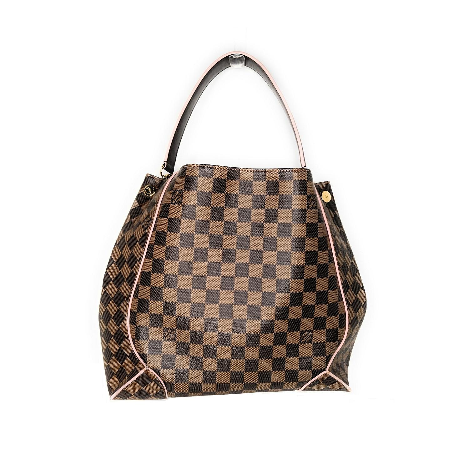 This chic hobo is finely crafted of classic Louis Vuitton damier checked coated canvas with pink leather trim. The shoulder bag features a brown leather looping shoulder strap with polished brass anchors. The top opens to a pink microfiber interior
