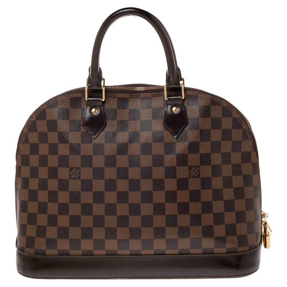 Out of all the irresistible handbags from Louis Vuitton, the Alma is the most structured one. First introduced in 1934 by Gaston-Louis Vuitton, the Alma is a classic that has received love from icons. This piece comes crafted from Damier Ebene and