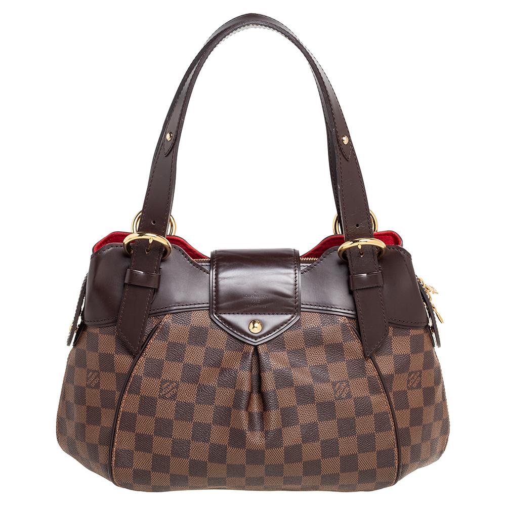 Louis Vuitton's handbags are popular due to their high style, durability, and functionality. This Sistina PM bag, like all the other designs, is lasting and stylish. It is made from Damier Ebene canvas and leather on the exterior with distinct