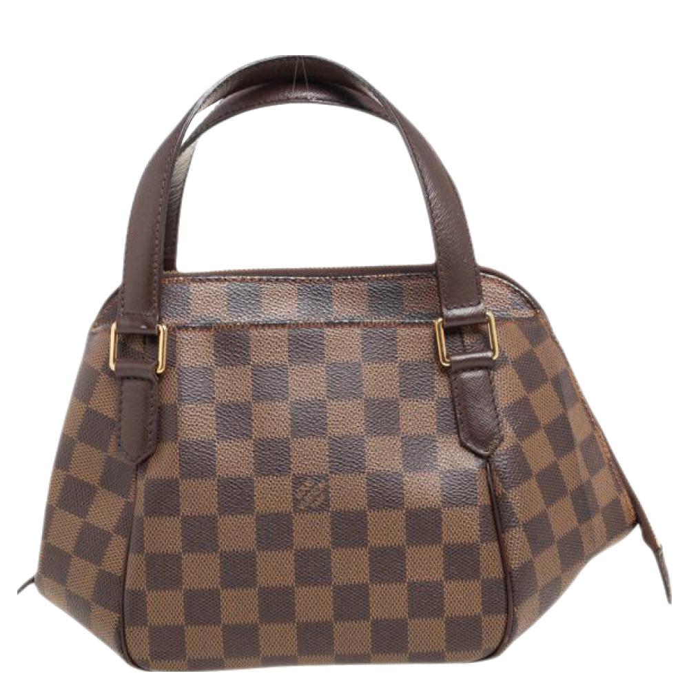 Looking for a bag that is both unique and practical? Then look no further than this Louis Vuitton Damier Ebene Canvas Belem PM Bag. The Damier Ebene coated canvas features two outer zipped pockets for easy access and double flat handles. This petite