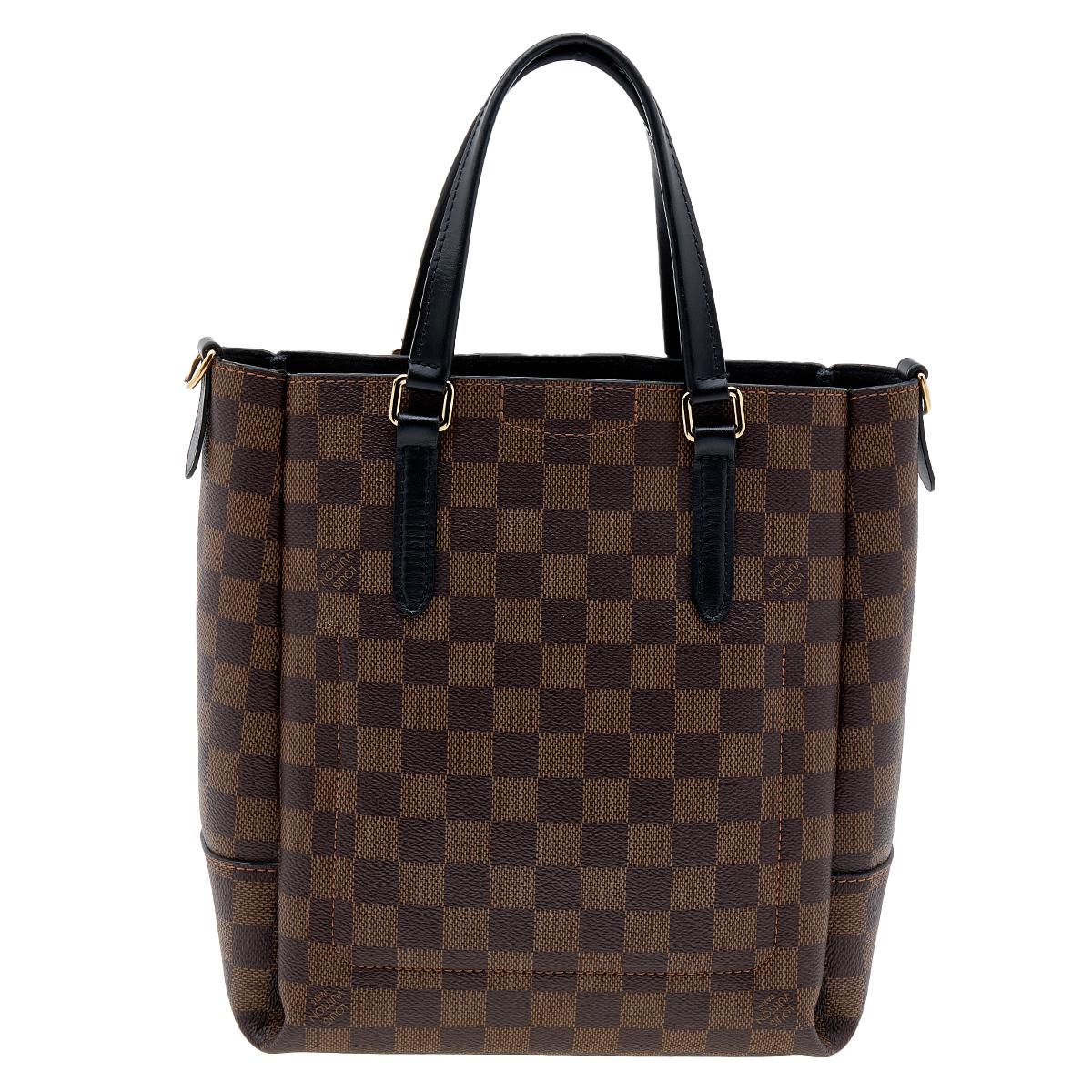 Louis Vuitton's Belmont bag is designed to assist you seamlessly in putting your best foot forward. Carrying it will always be a delight! It comes crafted from the signature Damier Ebene canvas and features dual top handles. It also comes with a