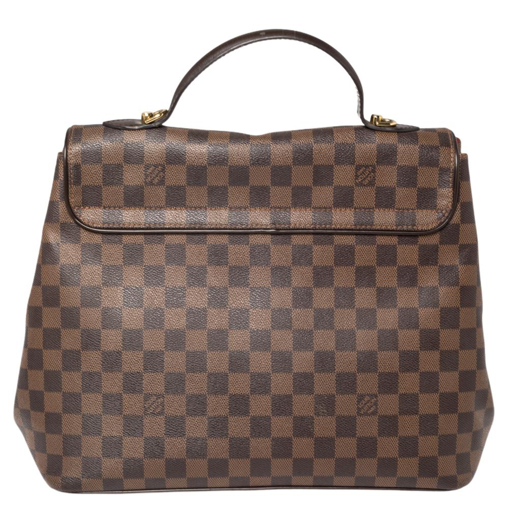 Louis Vuitton is trusted to mark a striking statement in the world of fashion with its phenomenal pieces. This Bergamo bag surely meets your expectations. This creation has been beautifully crafted from Damier Ebene canvas and styled with a flap