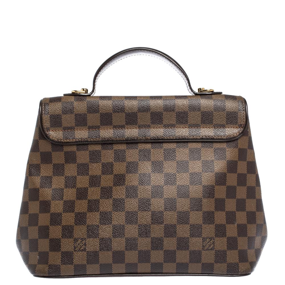 Louis Vuitton is trusted to mark a striking statement in the world of fashion with phenomenal pieces. This Bergamo bag surely meets the expectations. This creation has been beautifully crafted from Damier Ebene canvas and styled with a flap that has