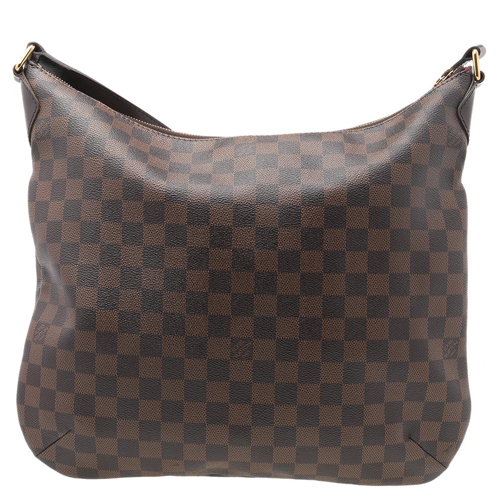 Crafted from Leather, this Bloomsbury bag from Louis Vuitton is sure to elevate your style. It features a subtle pleat on the front with a Louis Vuitton plaque, a front pocket, and a fabric interior secured by a zipper. It is complete with an