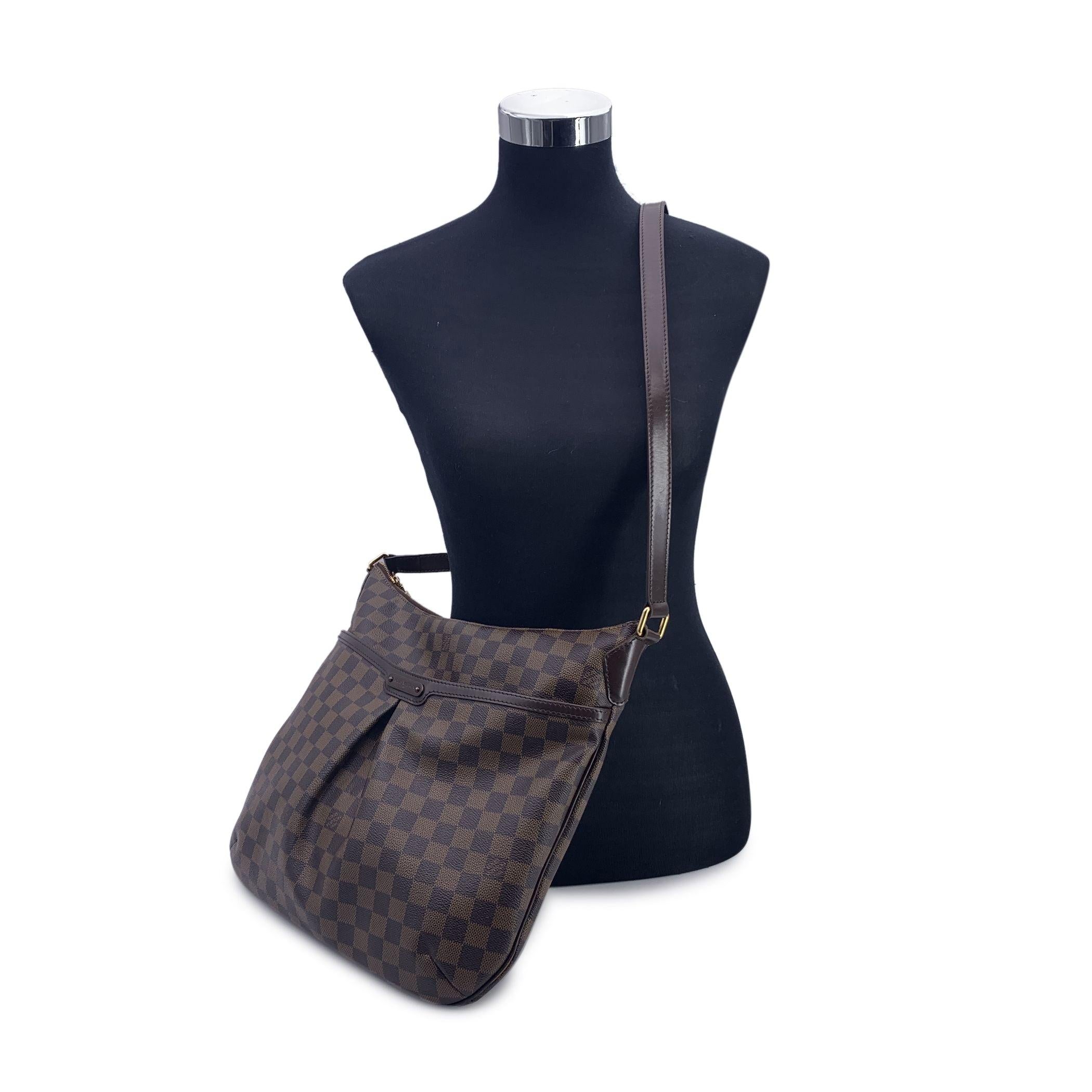 This beautiful Bag will come with a Certificate of Authenticity provided by Entrupy. The certificate will be provided at no further cost. LOUIS VUITTON 'Bloomsbury' shoulder bag. Designed with the damier ebene canvas and accented with brown leather