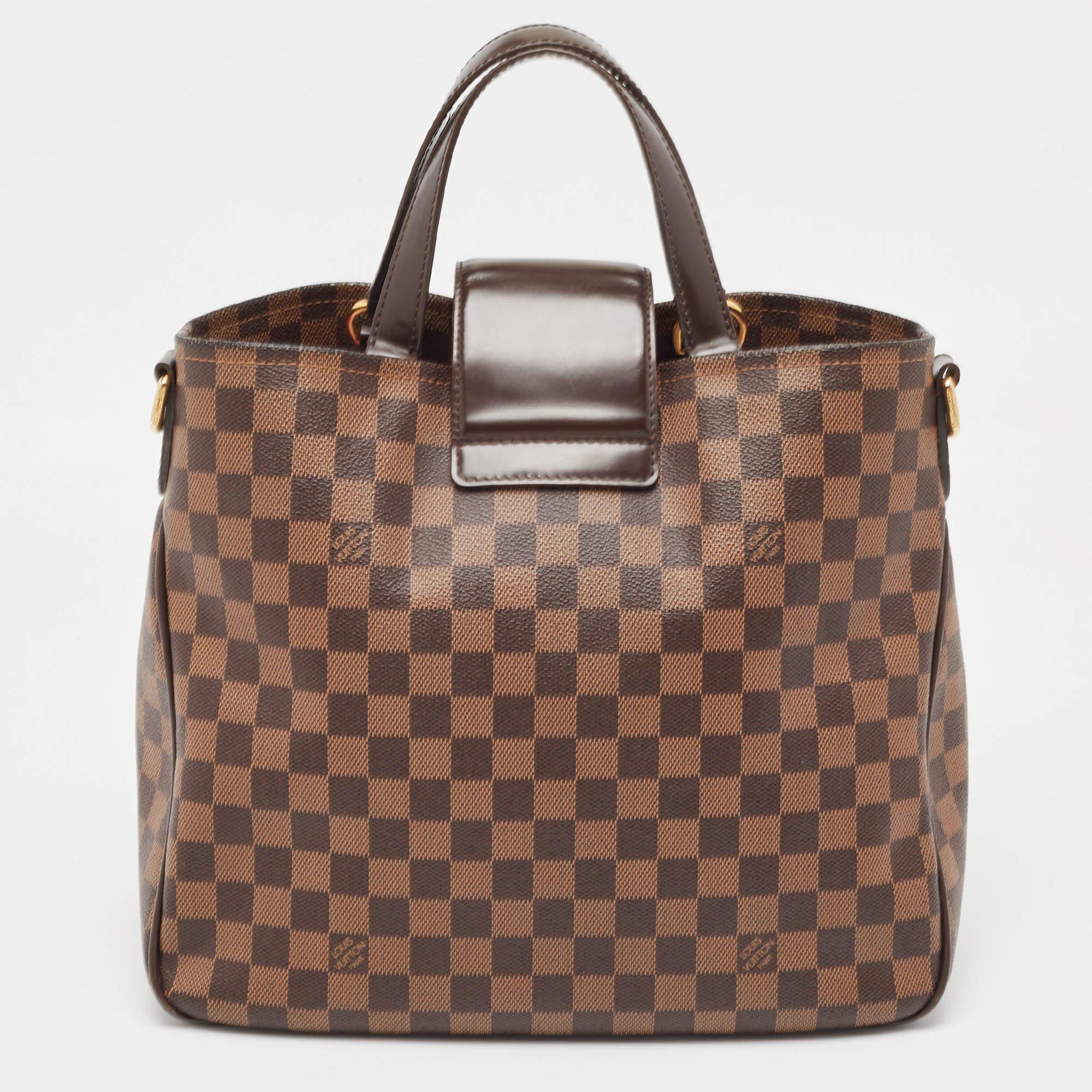 Combining Louis Vuitton’s rich heritage with exquisite craftsmanship, this Cabas Rosebery Bag is one you shouldn't miss. Made from signature Damier Ebene canvas, this fabulous style is finished with leather trims and two handles. The metal lock at