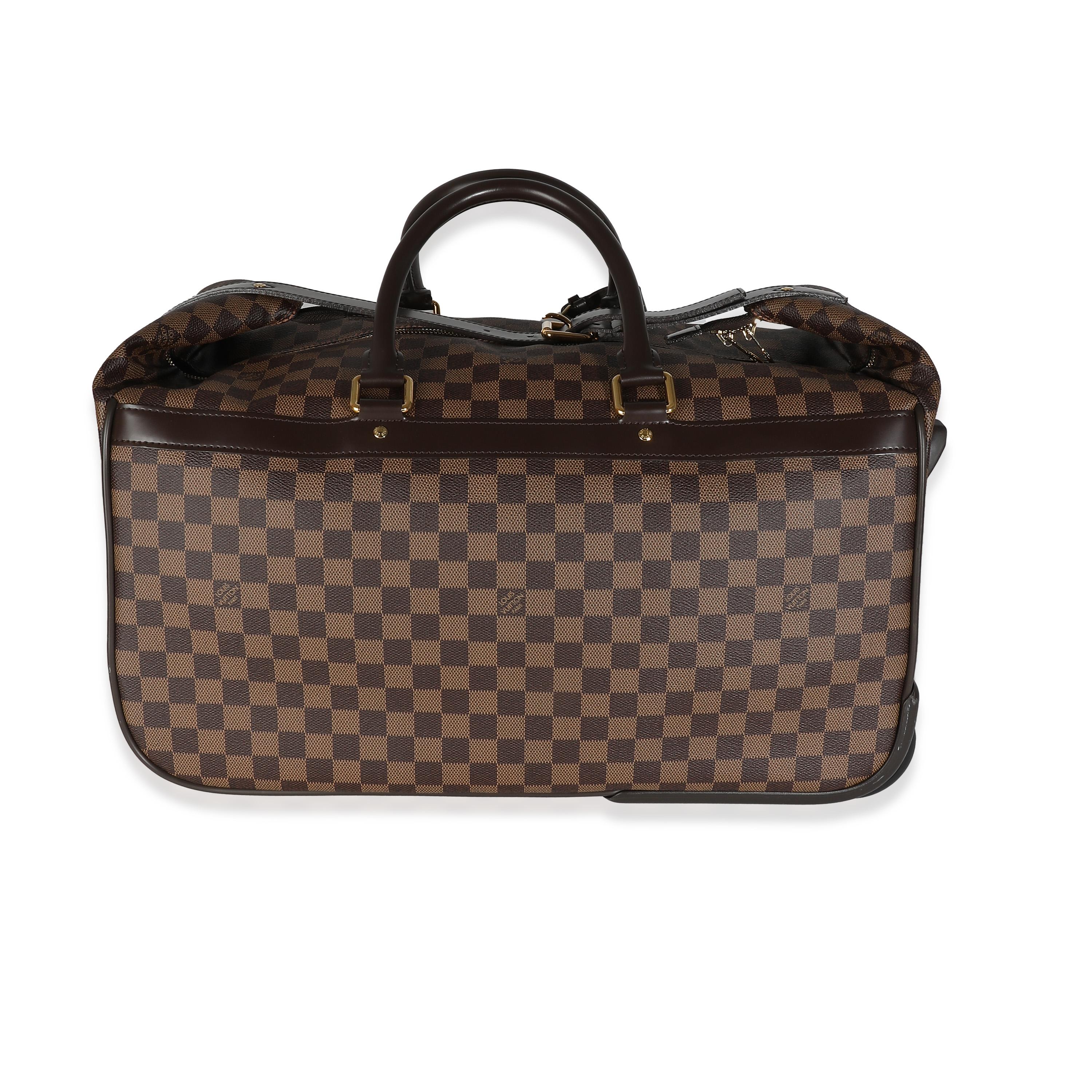 Listing Title: Louis Vuitton Damier Ebene Canvas Eole 50
SKU: 142328
Condition: Pre-owned 
Handbag Condition: Very Good
Condition Comments: Item is in very good condition with minor signs of wear.  Light scuffing along base and corners. Creasing