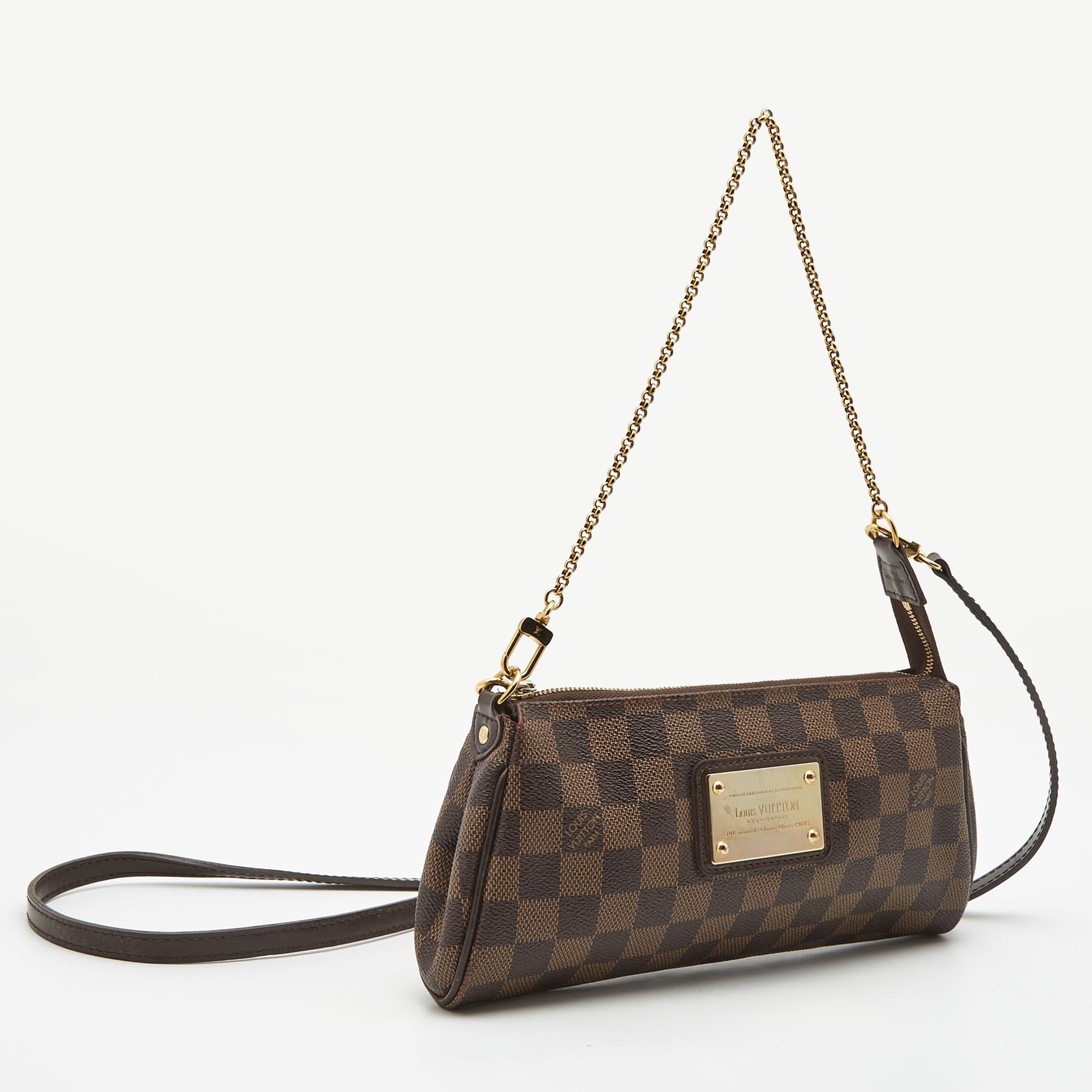Marked by flawless craftsmanship and enduring appeal, this Louis Vuitton Eva pochette is bound to be a versatile and durable accessory. It has a compact size.

Includes: Invoice, Original Dustbag, Brand Box, Detachable Strap