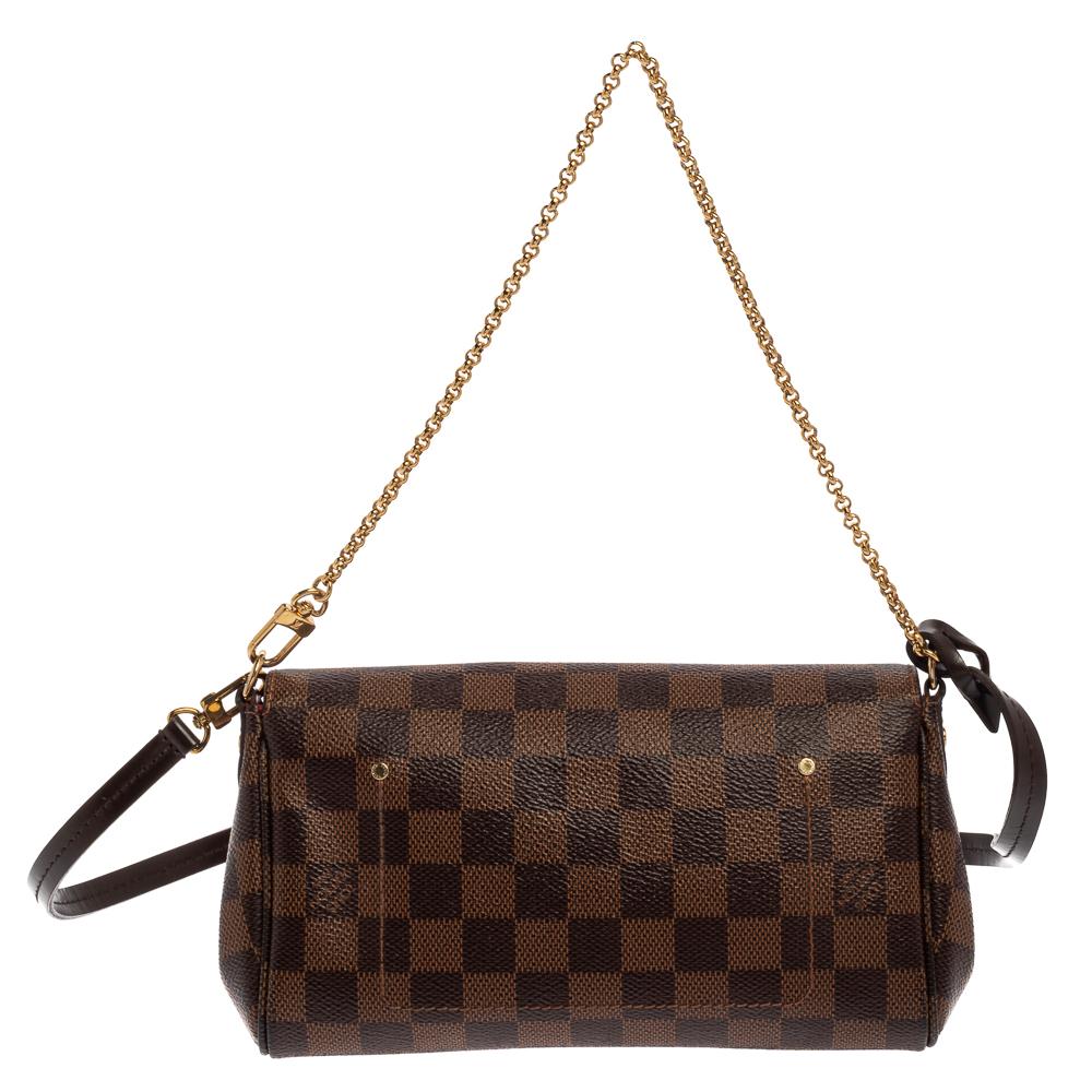 Louis Vuitton's handbags are popular owing to their high style and functionality. This Favorite Bag, like all the other handbags, is durable and stylish. Crafted from Damier Ebene canvas, the bag comes with a flap that opens to reveal a canvas