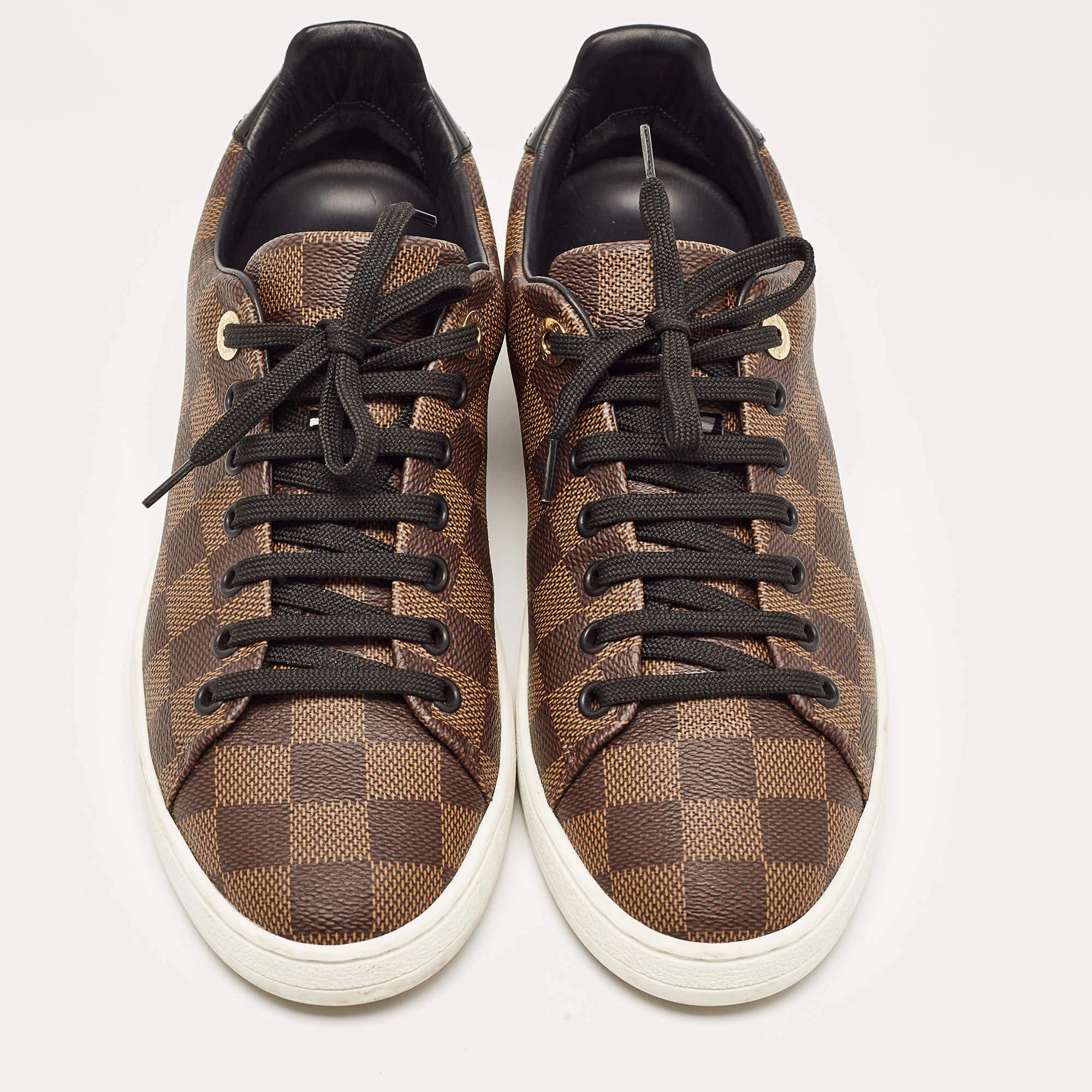 These Frontrow sneakers from Louis Vuitton are all you need to add an extra edge to your outfit. This pair has been crafted from Damier Ebene canvas and styled with round toes, lace-ups and gold-tone logo details on the midsoles. Balanced on rubber