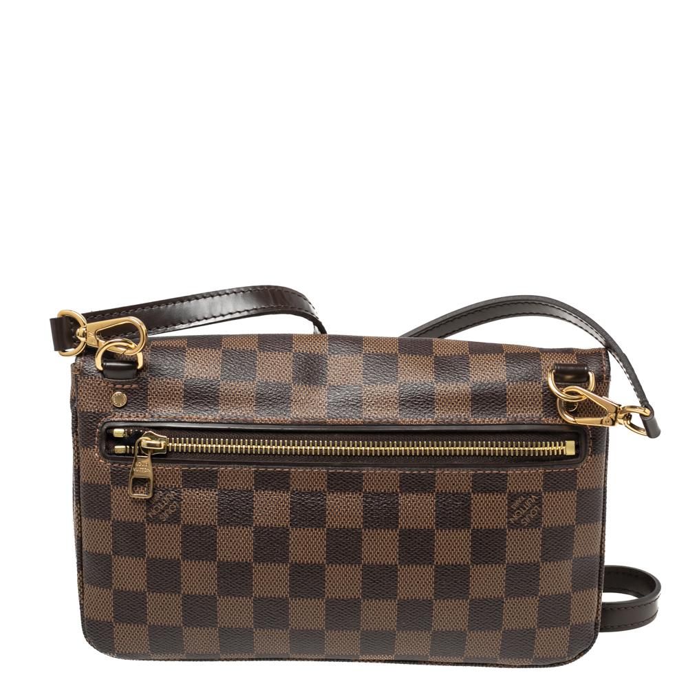 Everyone knows Louis Vuitton is known for making bags that are exquisite and lasting. This Hoxton PM bag speaks style and elegance in every way. It has been designed using Damier Ebene canvas with gold-tone hardware. It comes with a strap, leather