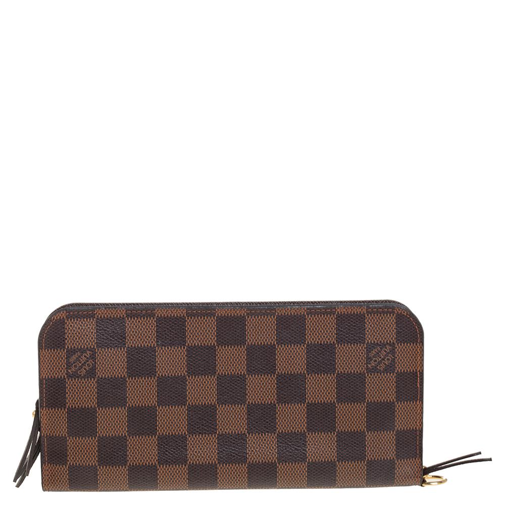 A wallet should not only be good-looking but also functional, just like this pretty Insolite from Louis Vuitton. Crafted in Spain, this gorgeous number flaunts the signature Damier pattern on the exterior and snap buttons that reveal multiple slots