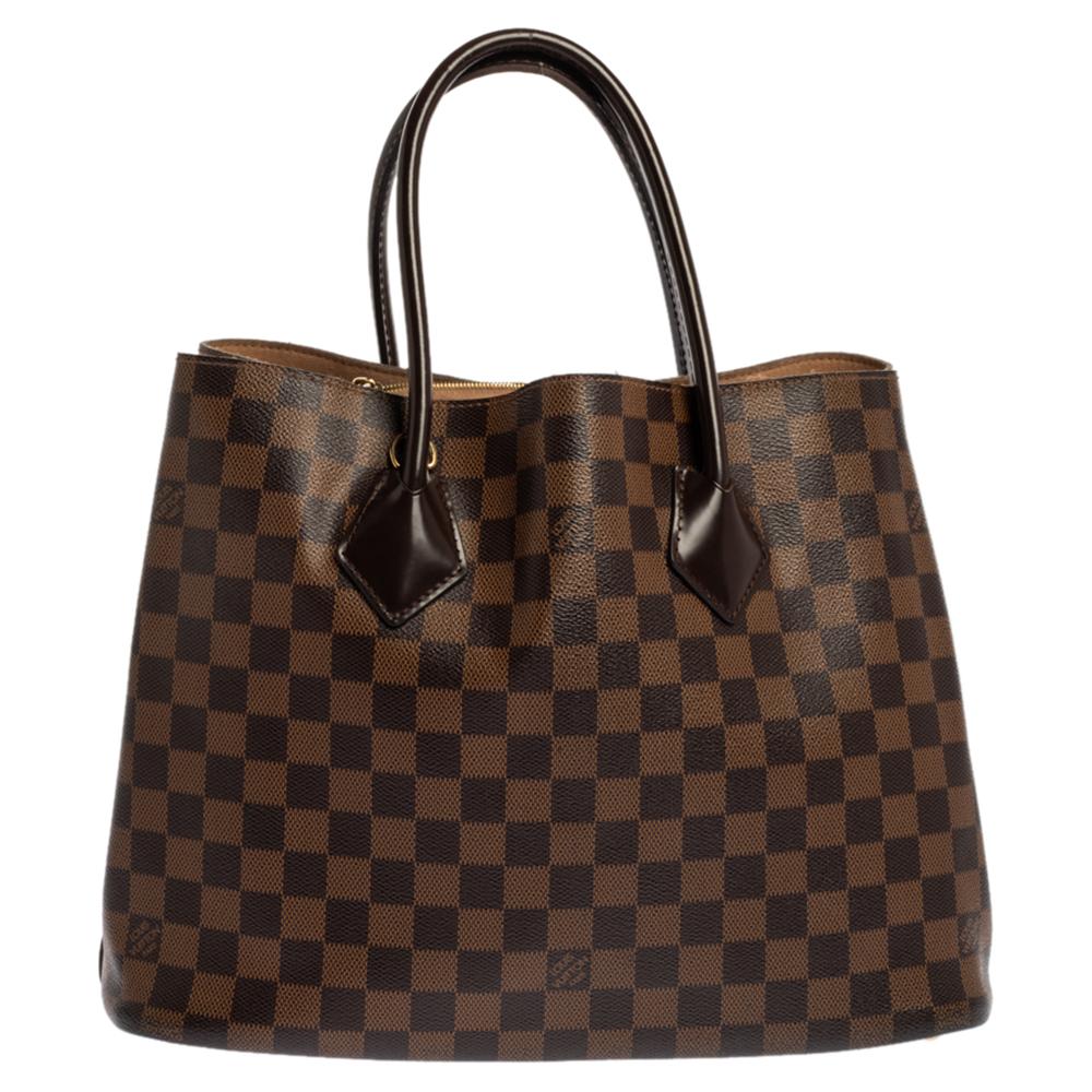 Spacious and captivating, this Kensington V bag is from Louis Vuitton. It has been crafted from Damier Ebene canvas and accented with gold-tone hardware. It is equipped with two handles, and an open-top that reveals a well-sized Alcantara interior.