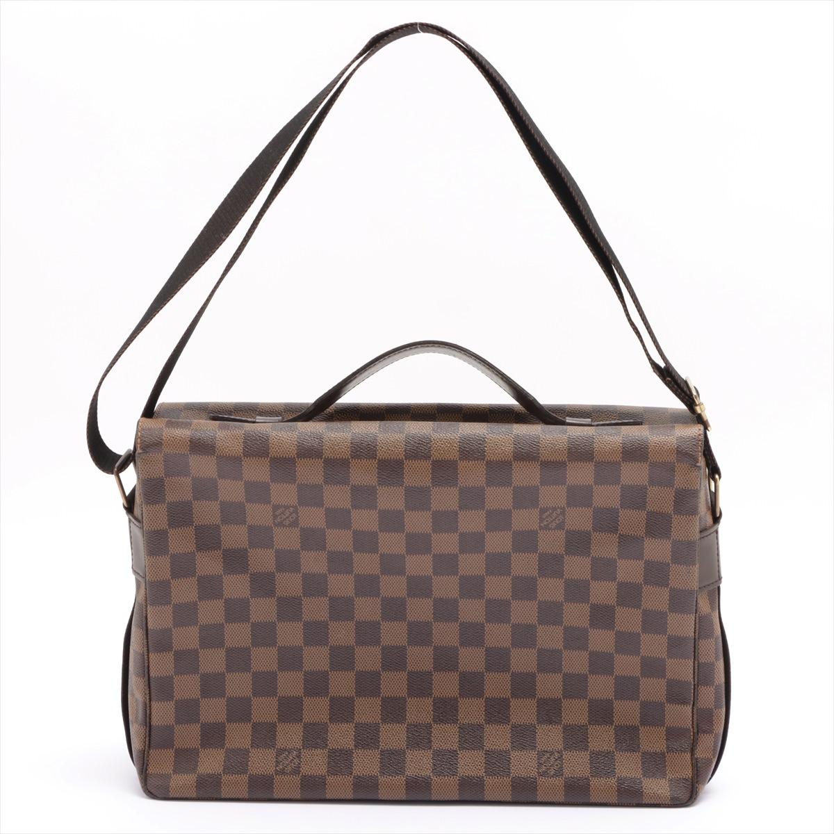 Brown and tobacco Damier Ebene coated canvas Louis Vuitton Broadway messenger bag with dark brown leather trim, gold-tone hardware, red canvas lining, dual interior slit pockets, dual exterior front pockets, leather top handle, adjustable canvas