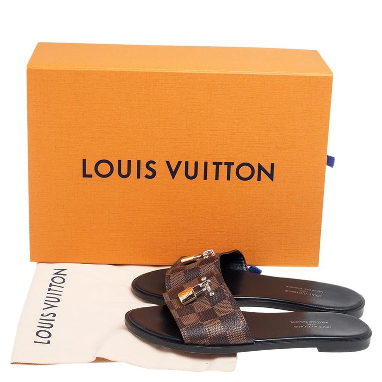 Louis Vuitton Brown Leather Lock It Flat Slides Size 36 Louis Vuitton