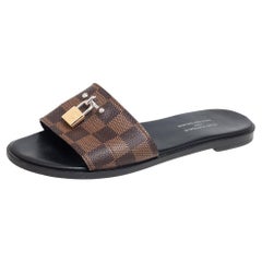 Louis Vuitton Lock It Flat Mule Cacao. Size 36.5