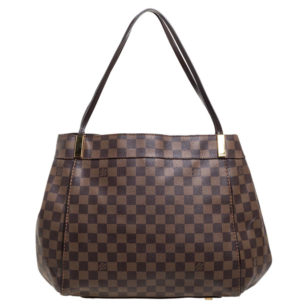 Louis Vuitton's handbags are popular owing to their high style and functionality. This Marylebone GM bag, like all the other handbags, is durable and stylish. Crafted from Damier Ebene canvas, the bag can be paraded using the leather handles. It is