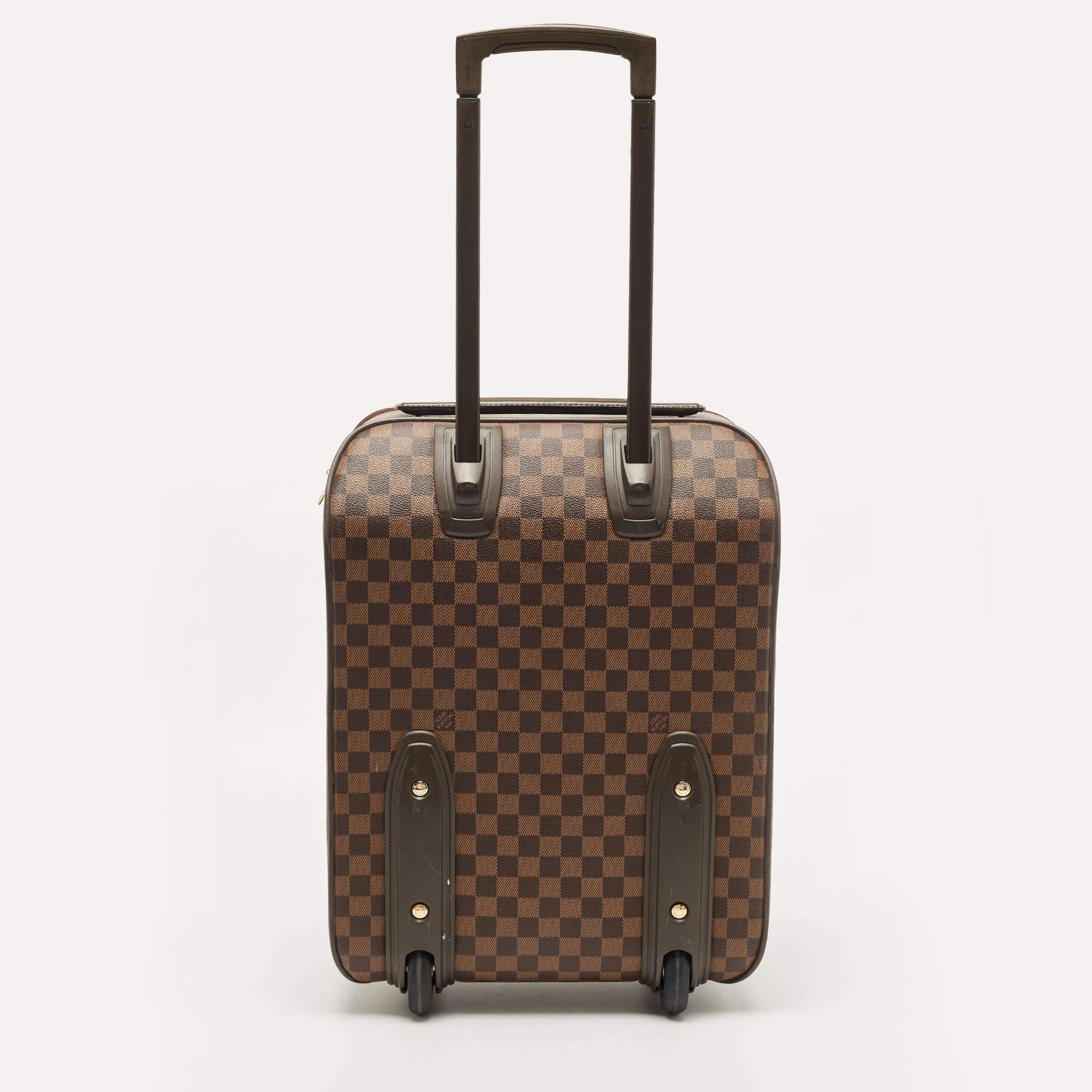 Taking Louis Vuitton's legendary art of travel elegantly forward, this suitcase, crafted from signature materials, flaunts traditional craftsmanship and an innovative, modern design. Lightweight, robust, and ultra-mobile, it glides along smoothly on