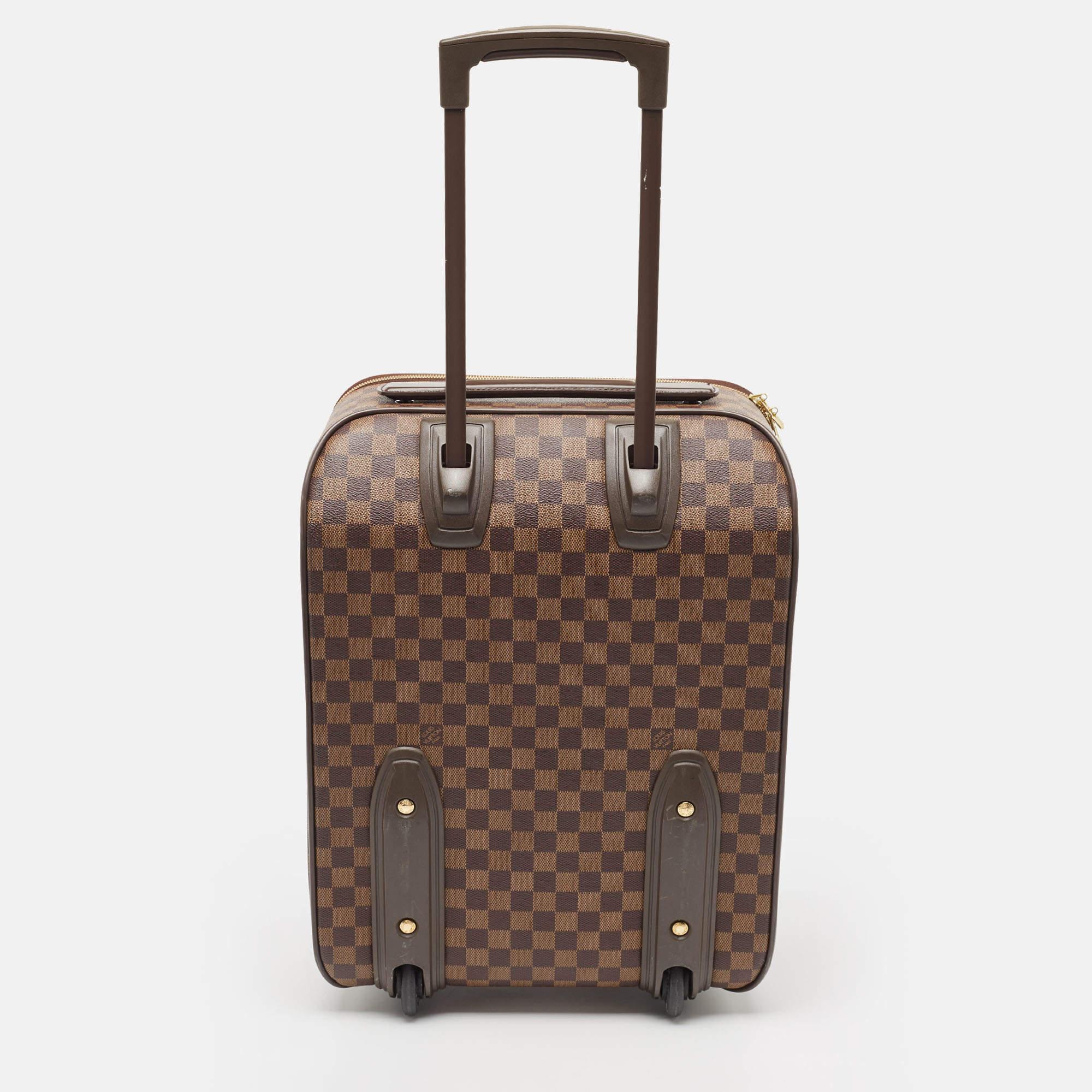 A traveling partner to trust and treasure is this one from Louis Vuitton. The exterior has been crafted from Damier Ebene canvas while the spacious interior is lined with nylon. The case is functional and reliable.

Includes: Padlock & Key