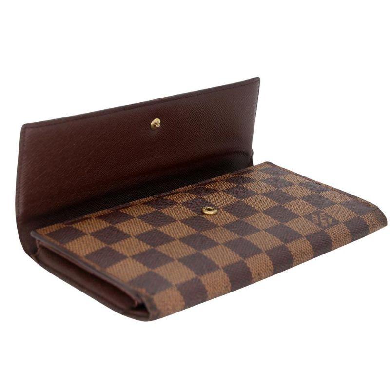 Louis Vuitton Damier Ebene Canvas Sarah Travel Wallet LV-0402N-0105

This Louis Vuitton Damier Canvas Sarah Wallet is the most elegant way to organize your essentials like your bills, currency, credit cards and plenty of coins 6 credit card slots.