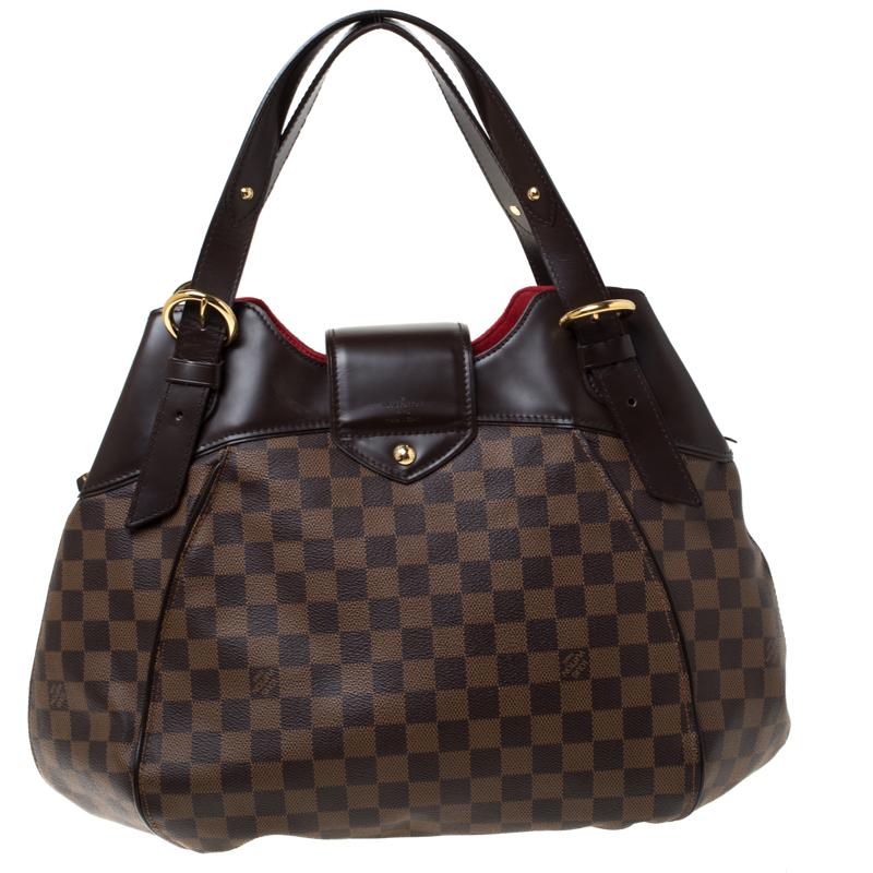 Louis Vuitton's handbags are popular owing to their high style and functionality. This Sistina GM bag, like all the other handbags, is durable and stylish. Crafted from Damier Ebene canvas, the bag can be paraded using the top handles. It is