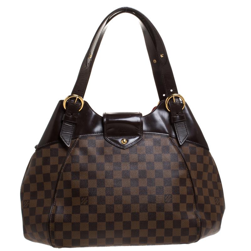 Louis Vuitton's handbags are popular owing to their high style and functionality. This Sistina GM bag, like all the other handbags, is durable and stylish. Crafted from Damier Ebene canvas, the bag can be paraded using the top handles. It is