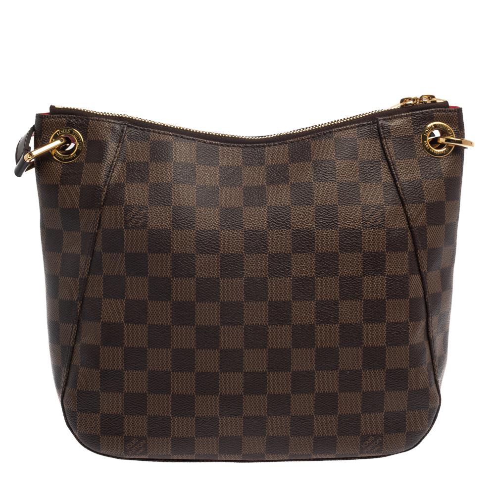 Louis Vuitton presents this elegant Besace bag for the fashionable you. This piece is crafted from Damier Ebene canvas and leather and has a beautiful interior lined with canvas. The bag features a single handle, a tassel detail, and a zip-enclosed