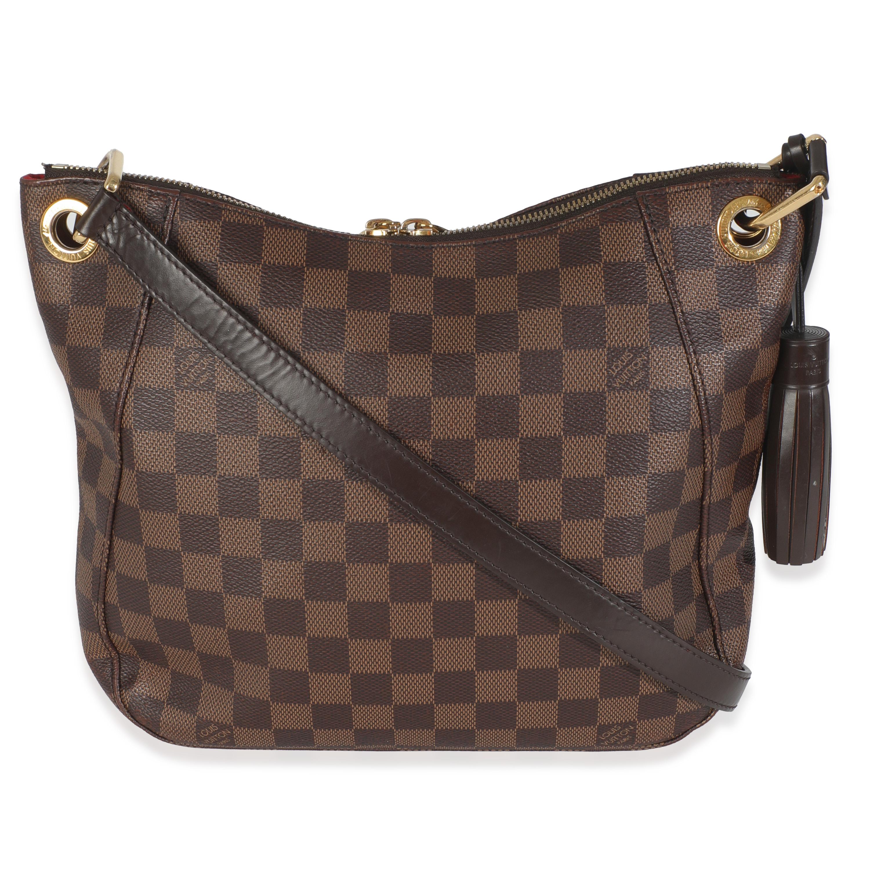 Listing Title: Louis Vuitton Damier Ebene Canvas South Bank Besace
SKU: 146621
Condition: Pre-owned 
Handbag Condition: Good
Condition Comments: Item is in good condition with apparent signs of wear. Extensive scuffing along exterior. Scratching