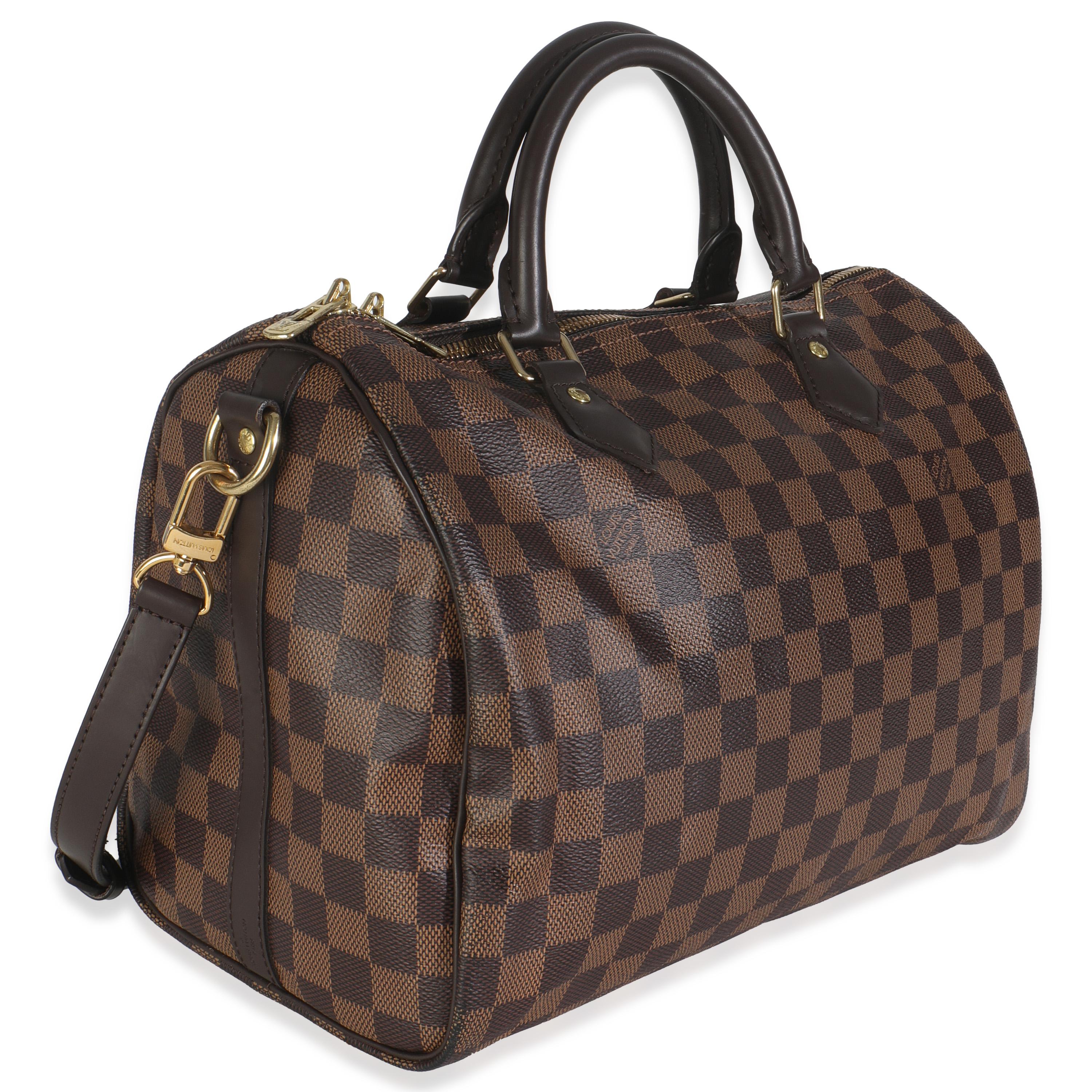 Titre de la liste : Louis Vuitton Damier Ebene Canvas Speedy Bandouliere 30
SKU : 148821
MSRP : 1980.00 USD
Condit : Usagé 
Description de l'état : Appelé à l'origine sac 