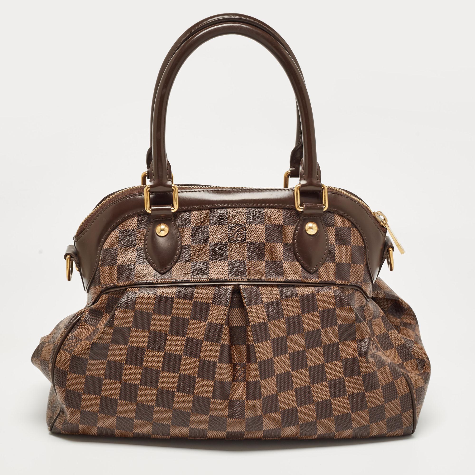 Displaying exquisite craftsmanship, this fabulous LV bag will certainly live up to your expectations. Featuring a chic design, it is made from luxe materials and has a roomy interior for carrying your essentials.

Includes: Detachable Strap