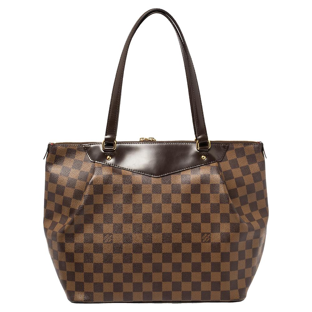 All of Louis Vuitton's handbags are high on style and craftsmanship. Created from their Damier Ebene canvas & leather, the Westminster bag has a fine finish. The bag features two top handles and a canvas-lined roomy interior secured by a zipper.