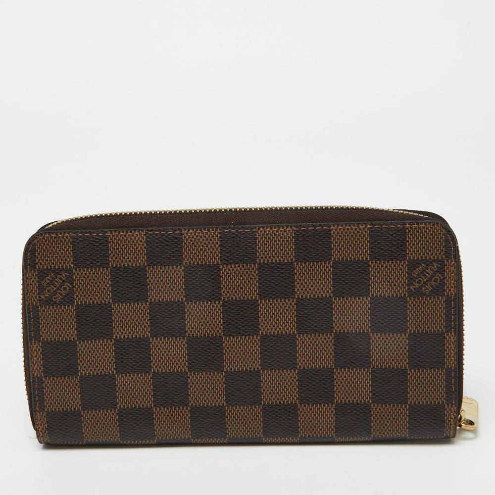 Women's Louis Vuitton Damier Ebene Canvas Zippy Wallet For Sale