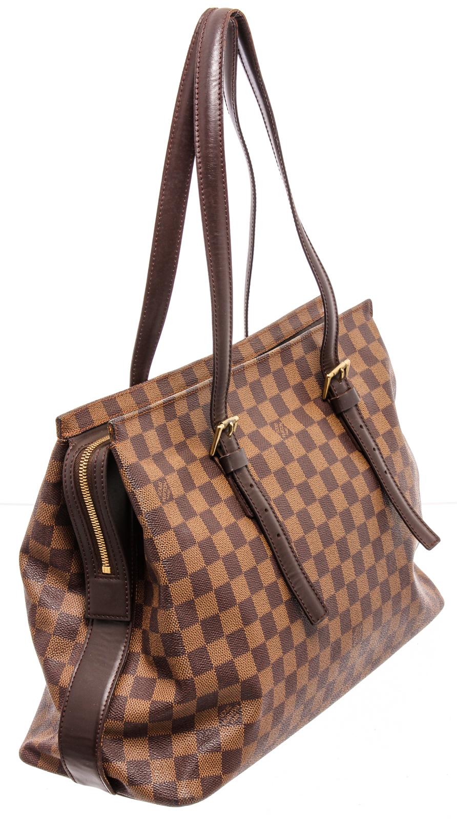 Brown Damier Ebene coated canvas Louis Vuitton Chelsea tote with brass hardware, brown leather accents, dual flat shoulder straps, brown canvas interior, single zip pocket at interior wall and zip closure at top. 

24752MSC