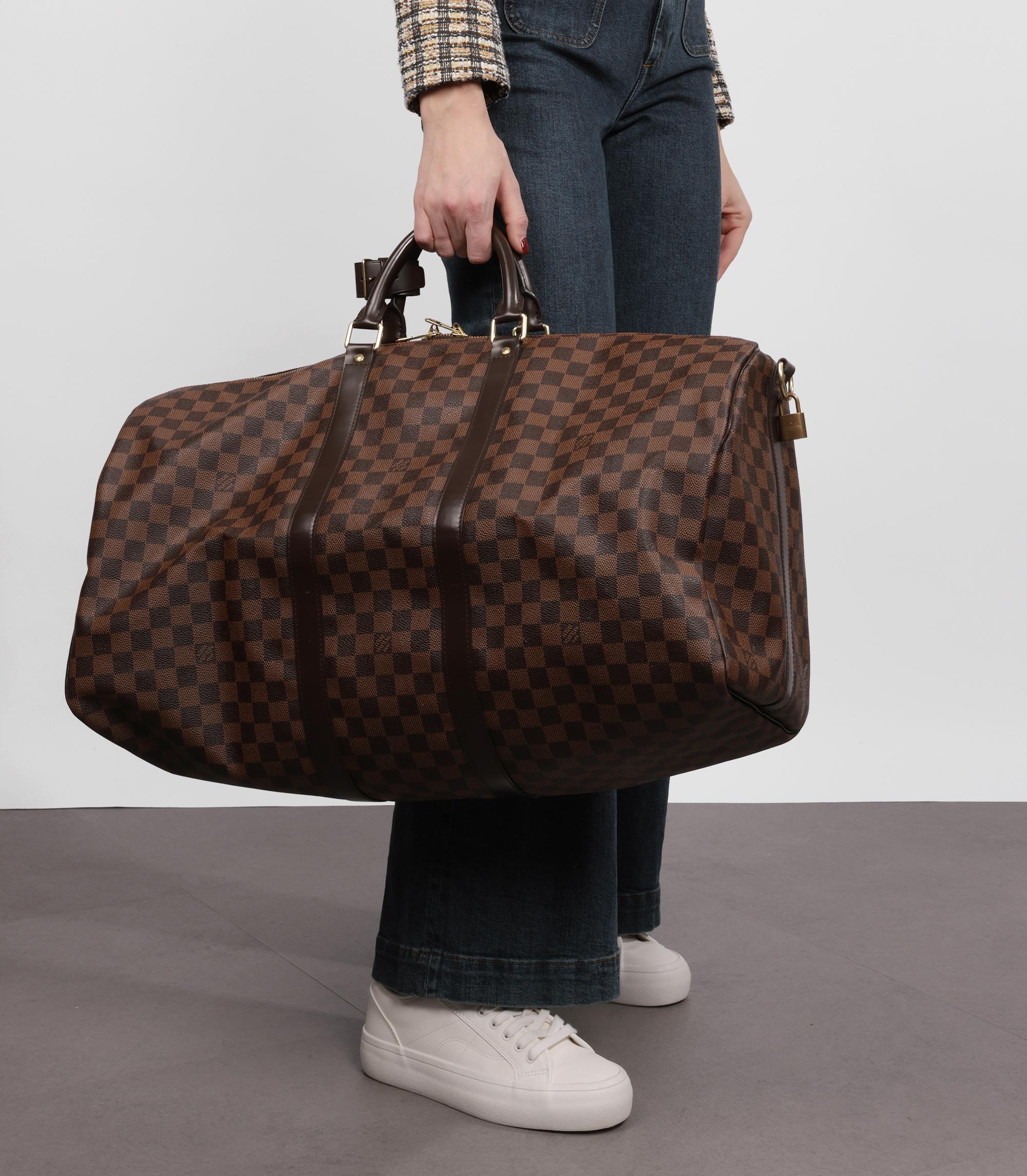 Louis Vuitton Damier Ebene Coated Canvas & Brown Calfskin Leather Keepall 55 Bandoulière

Brand- Louis Vuitton
Model- Keepall 55 Bandoulière
Product Type- Travel
Serial Number- MB****
Age- Circa 2015
Accompanied By- Louis Vuitton Dust Bag, Padlock,