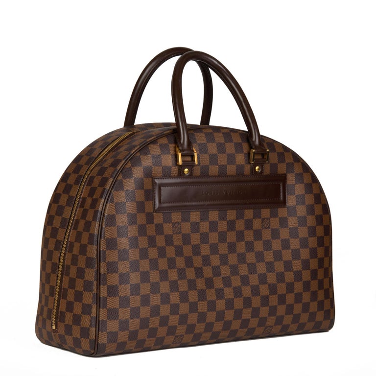 LOUIS VUITTON
Damier Ebene Coated Canvas & Calfskin Leather Nolita GM

Xupes Reference: CB612
Serial Number: SP0042
Age (Circa): 2002
Accompanied By: Louis Vuitton Dust Bag
Authenticity Details: Date Stamp (Made in France)
Gender: Ladies
Type: