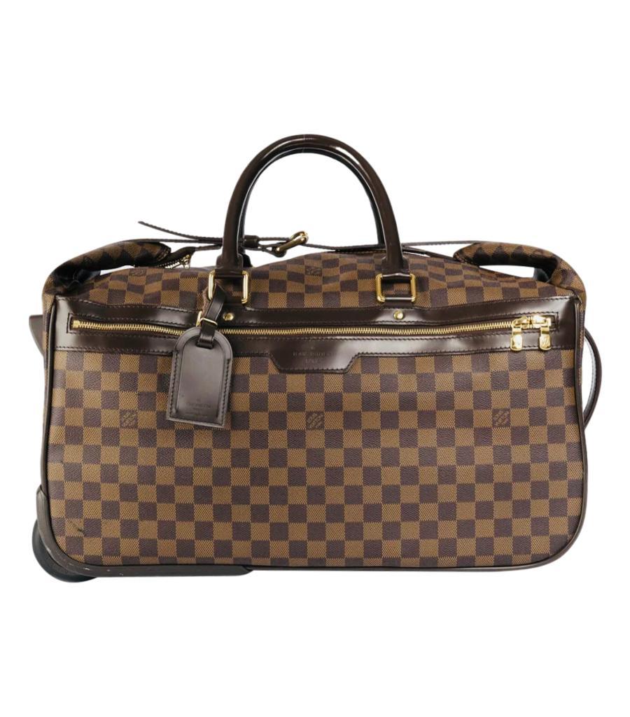 Louis Vuitton Damier Ebene Coated Canvas Eole Convertible Rolling Luggage Bag
Travel bag convertible into rolling luggage crafted in LV's signature Damier Ebene coated canvas.
Detailed with smooth brown leather trims and handles with gold hardware,
