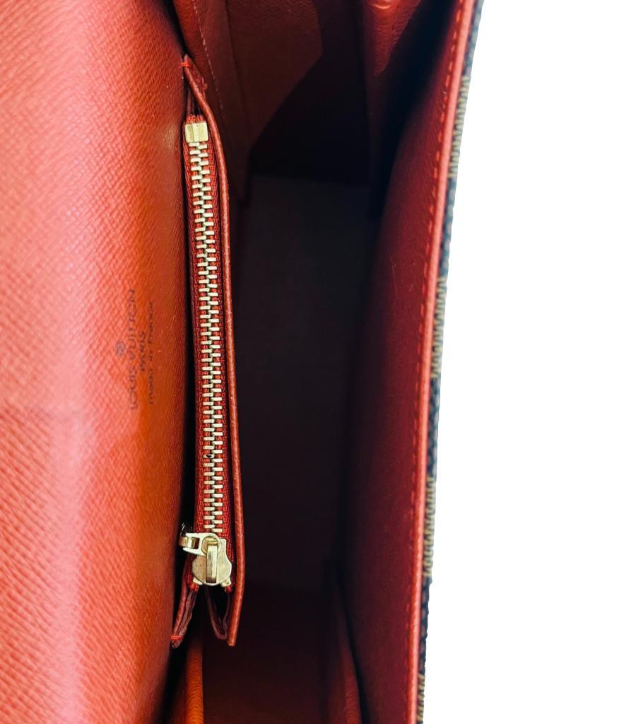 Louis Vuitton Damier Ebene Coated Canvas Tribeca Bag For Sale 1