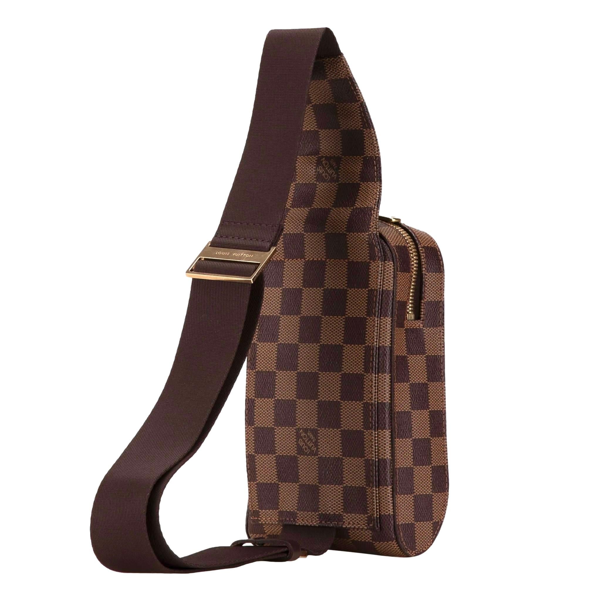 Louis Vuitton Damier Ebene Geronimos Shoulder Bag 

Brown crossbody bag crafted in coated canvas signature Damier Ebene with gold 'LV' engraved hardware.

Featuring adjustable canvas strap and zipped top leading to orange interior.

Rrp Approx.
