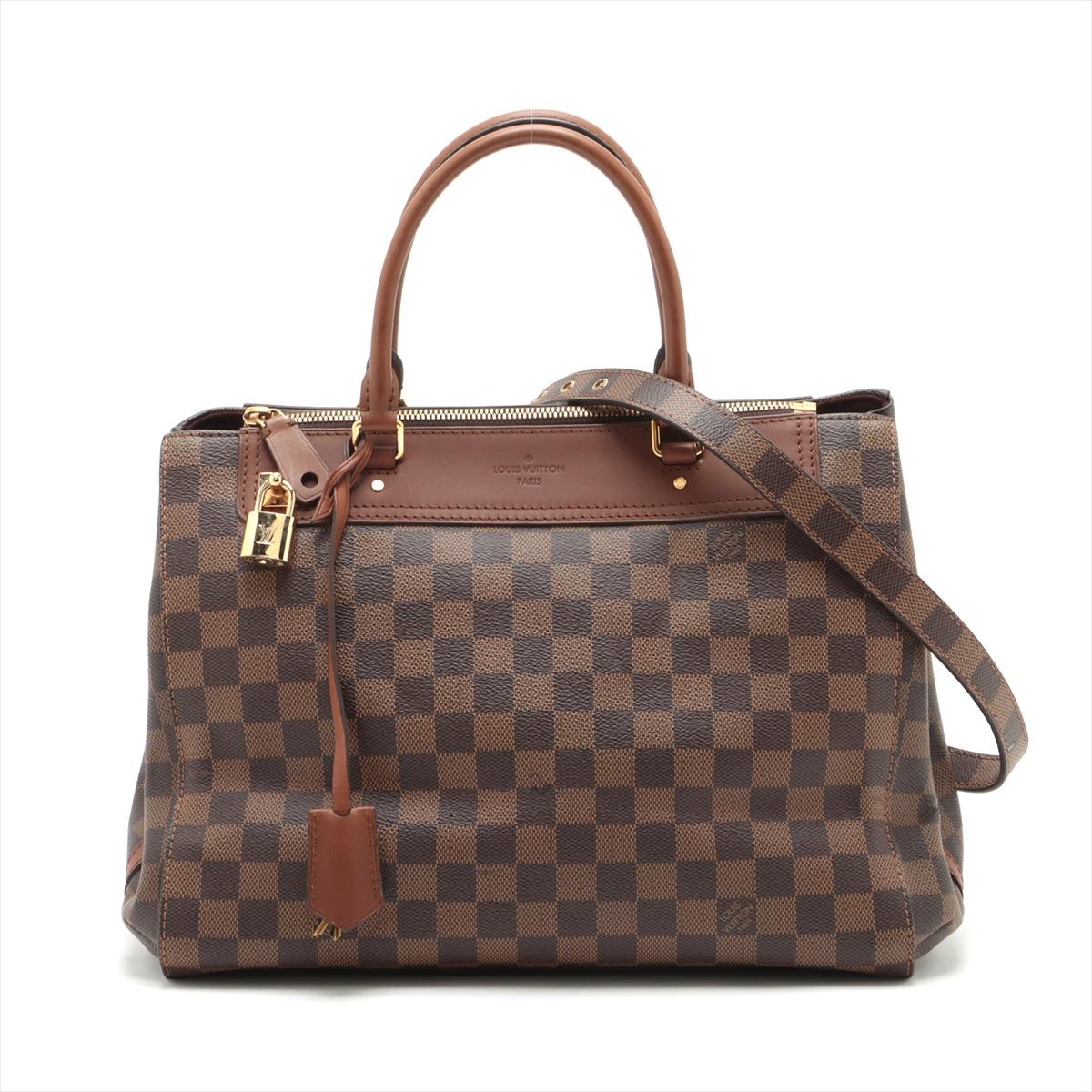 The Louis Vuitton Damier Greenwich Two-Way Handbag is a versatile and timeless accessory that exudes sophistication. Crafted from the iconic Damier canvas, the bag features a classic checkered pattern that reflects the brand's heritage. The neutral