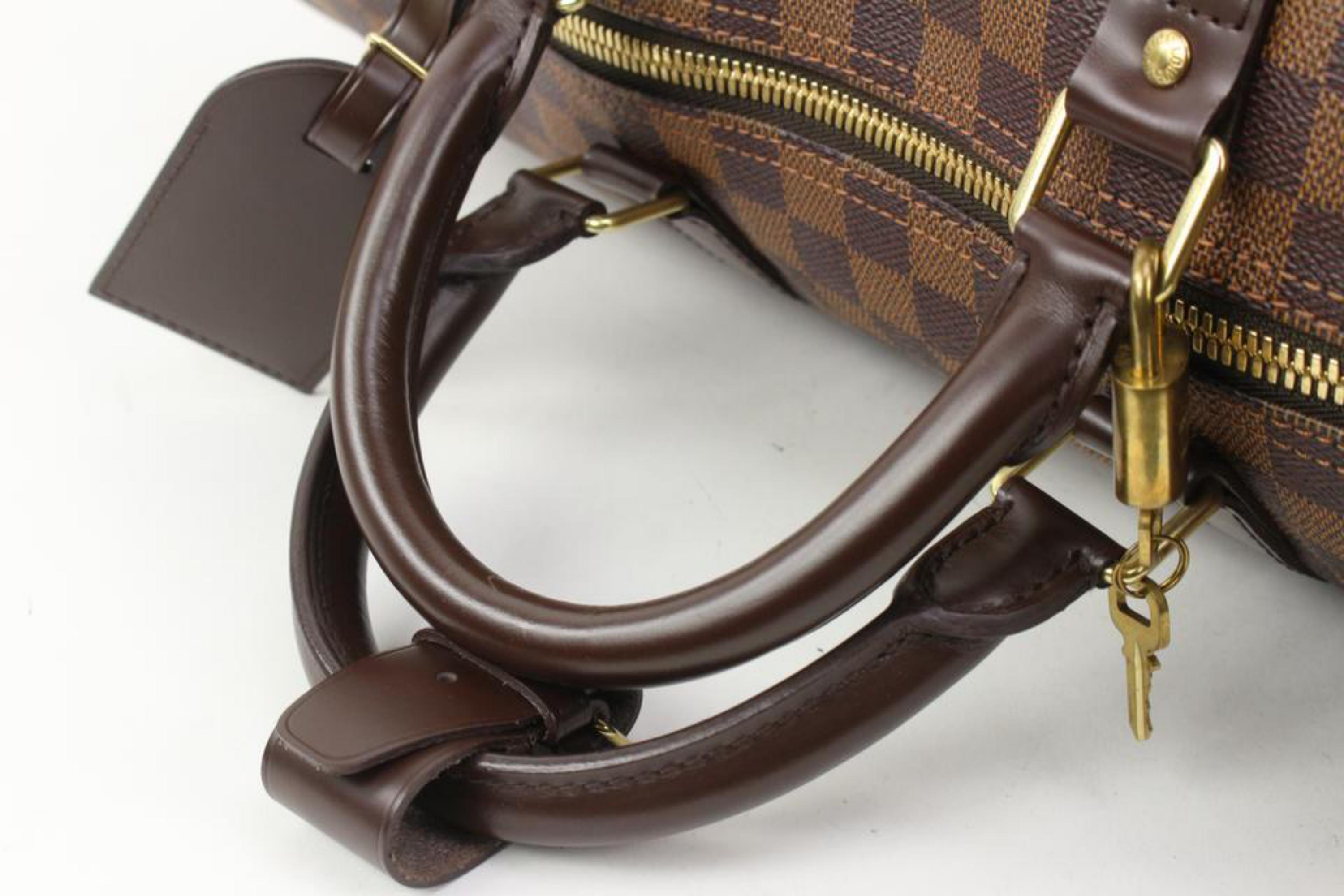 brown checkered duffle bag