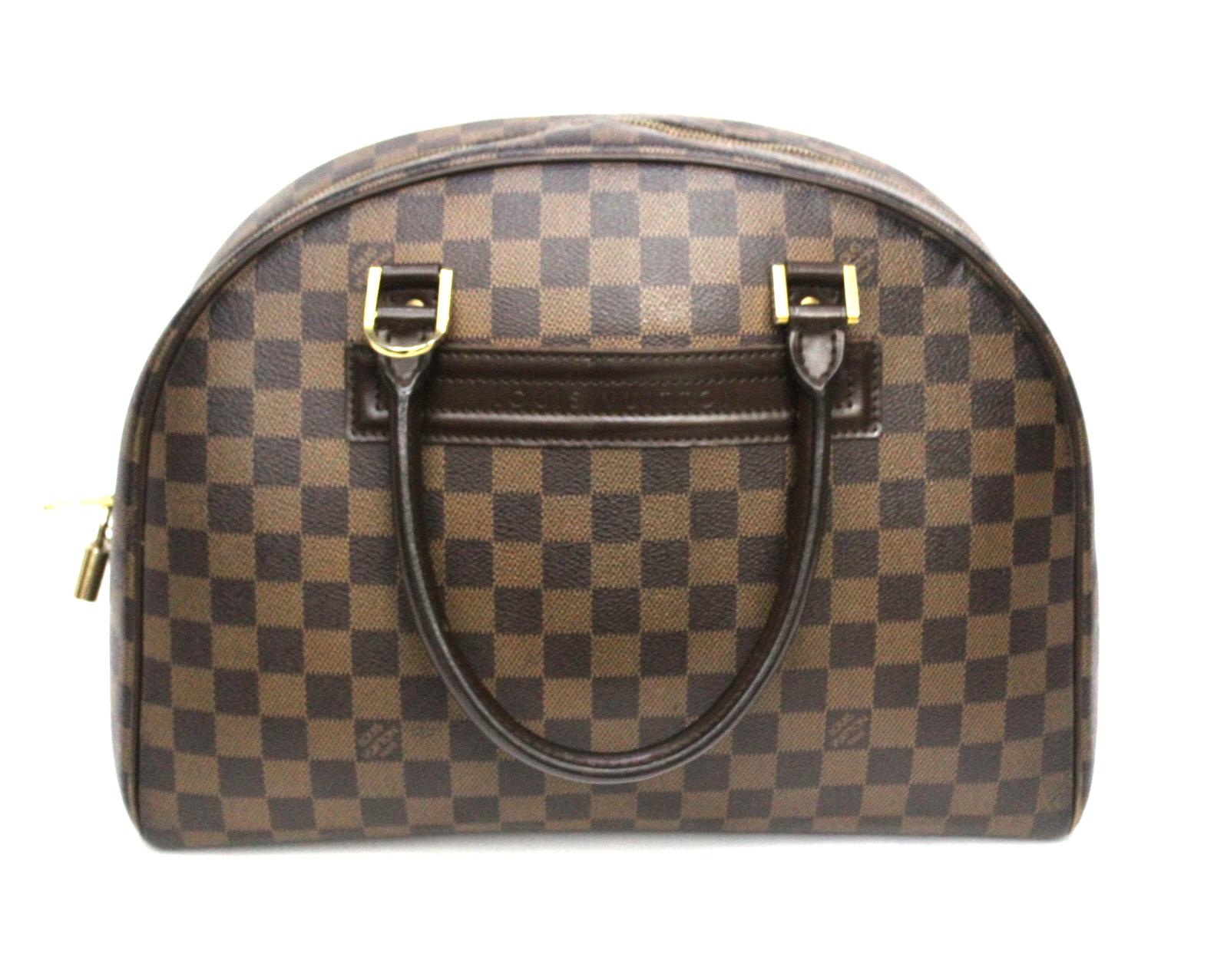 Superb Louis Vuitton model Nolita bag, in damier ebene with gold hardware. This rare bag is now out of production. Zip closure, spacious interiors to record all the daily essentials. The front of the bag is decorated with a Louis Vuitton logo
